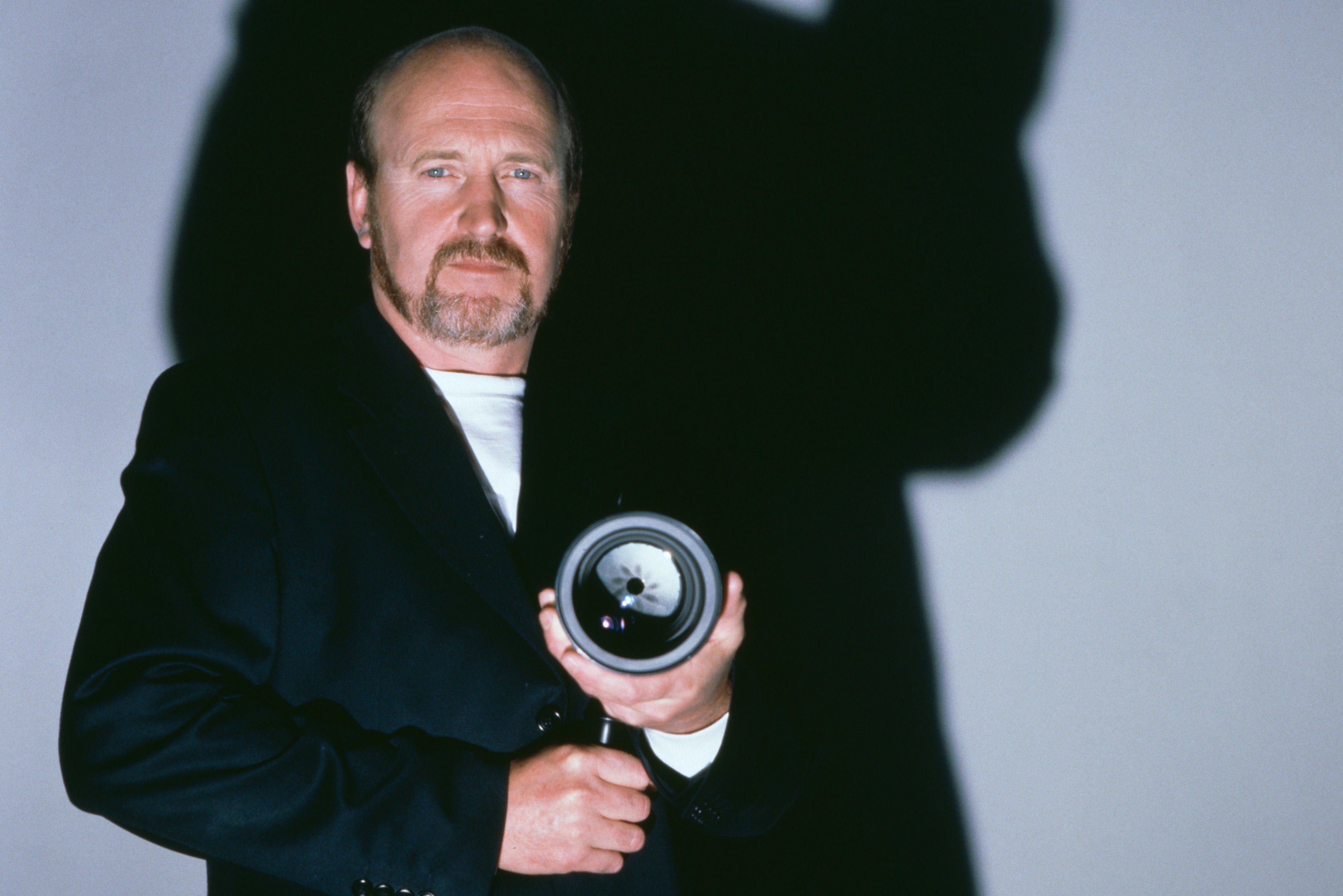 British cinematographer Roger Pratt, BSC poses with a director’s viewfinder, circa 1995