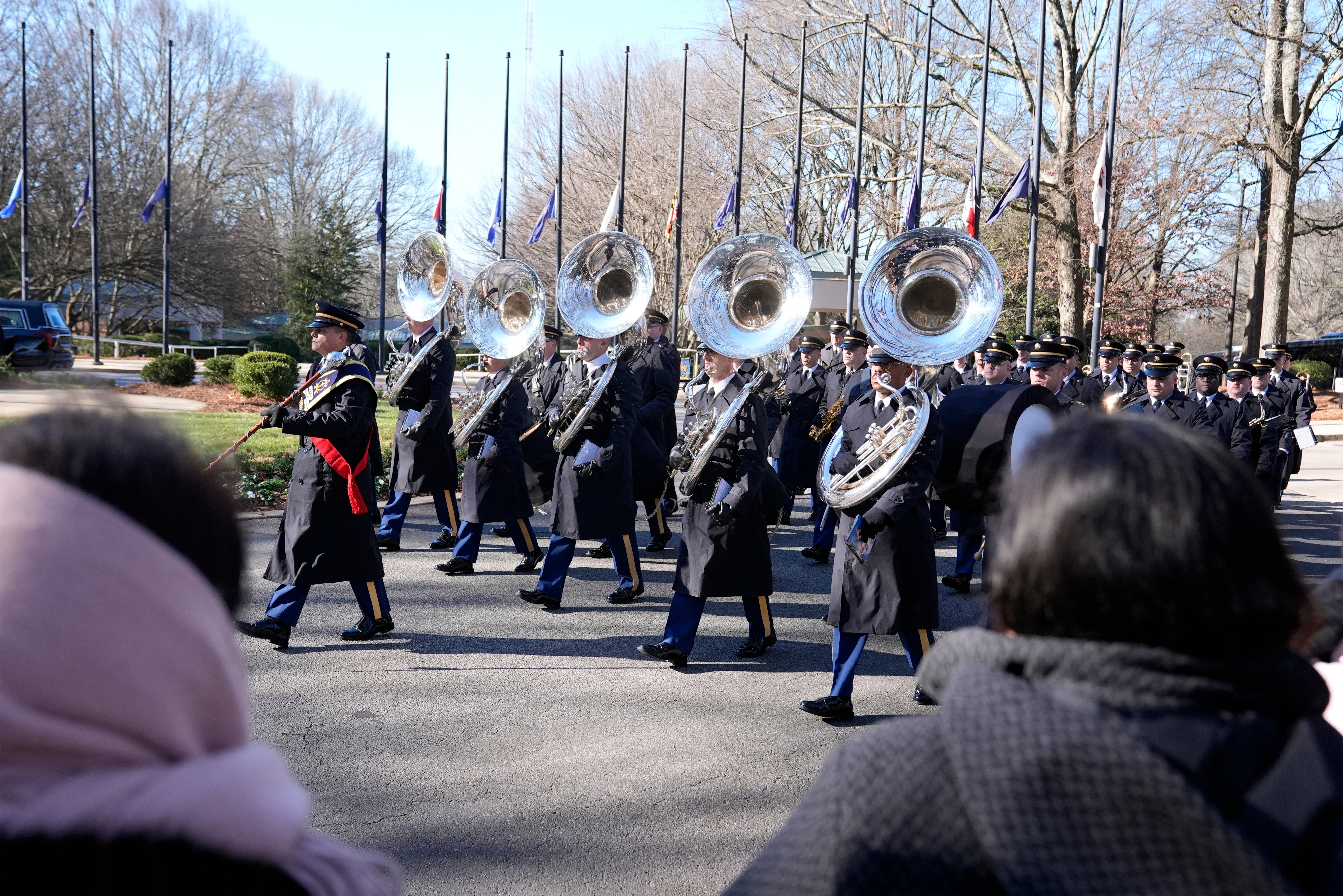 The 282nd Army Band moves into place before the casket of former President Jimmy Carter departs the Jimmy Carter Presidential Library and Museum in Atlanta, Georgia on January 7, 2025