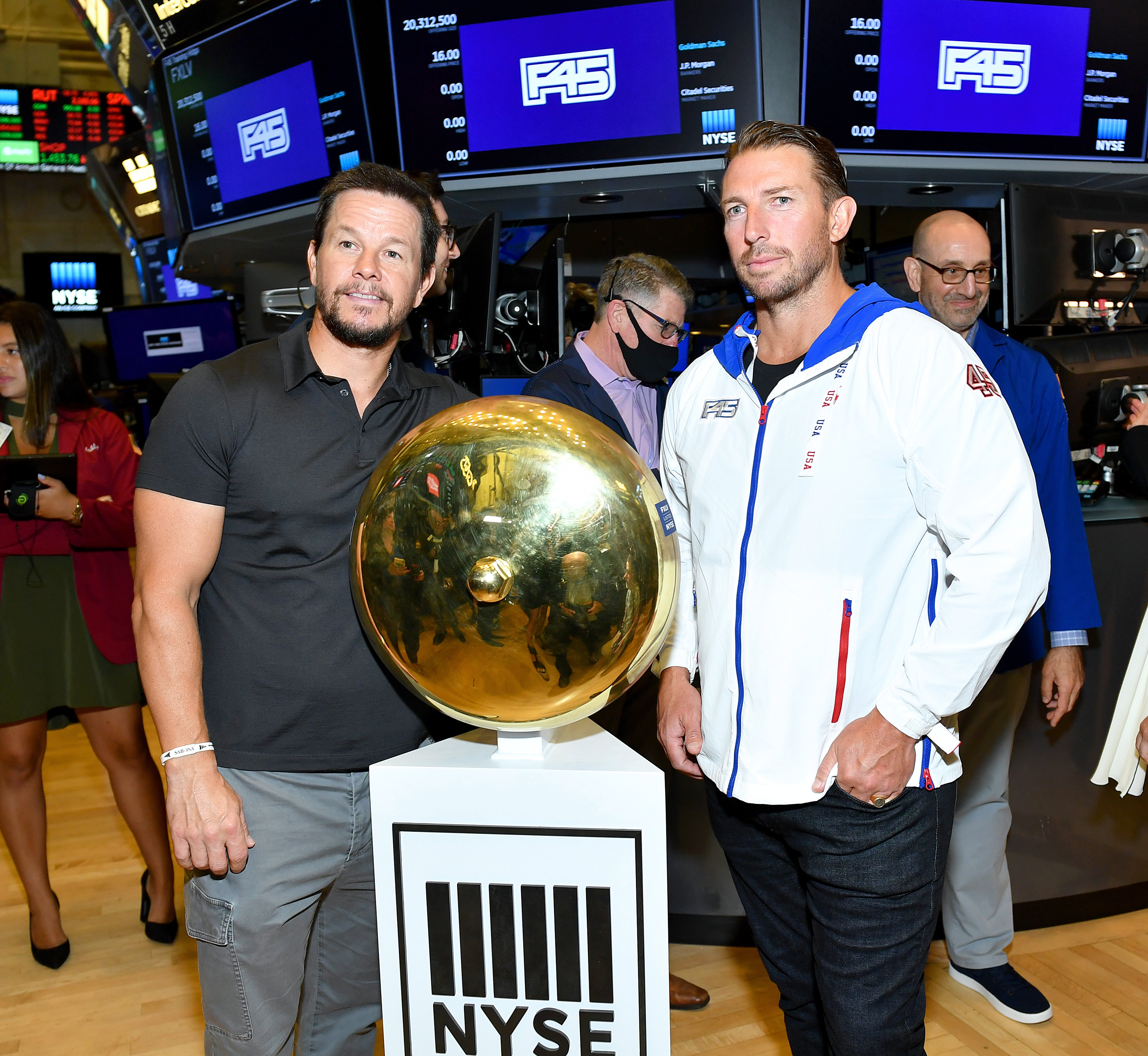 Actor Mark Wahlberg (left), seen here with F45 Founder and CEO Adam Gilchrist, owns several F45 franchises in the Boston area