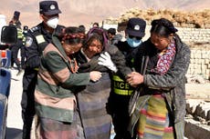 Tibet earthquake rescuers race to reach survivors trapped in icy conditions