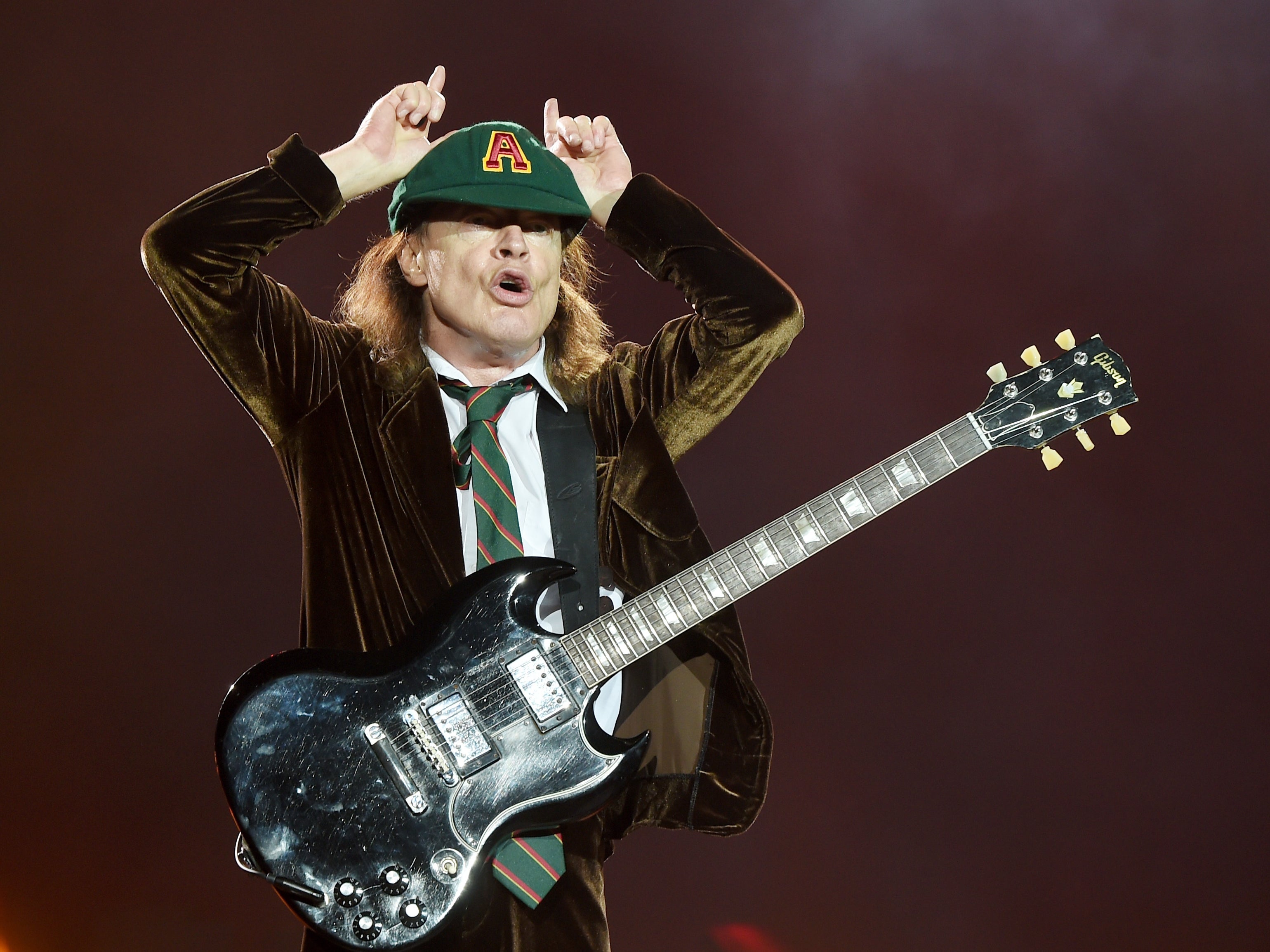 Angus Young (pictured) and his brother Malcolm formed AC/DC at the property in Burleigh Street