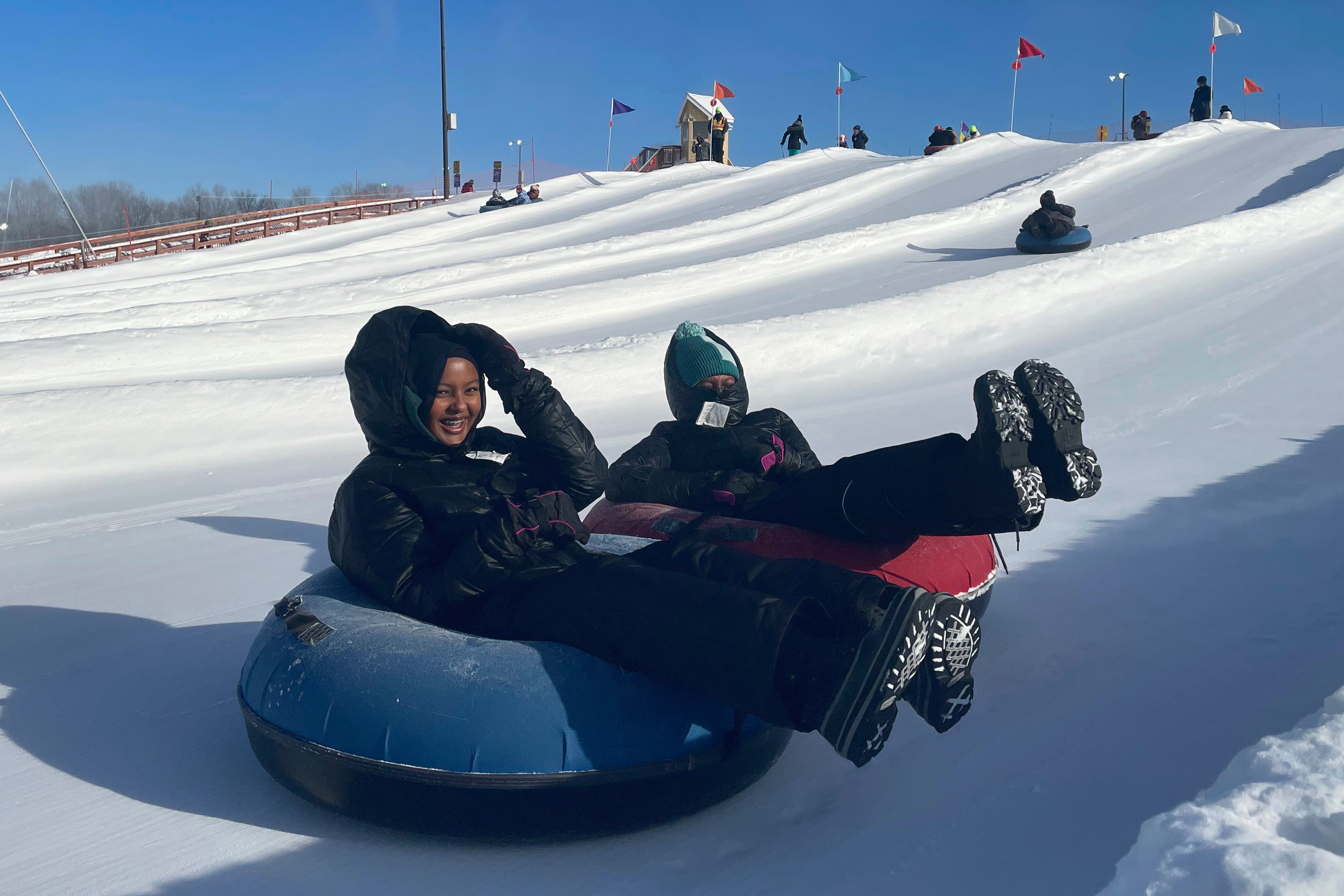 Snow Tubing in Hijabs
