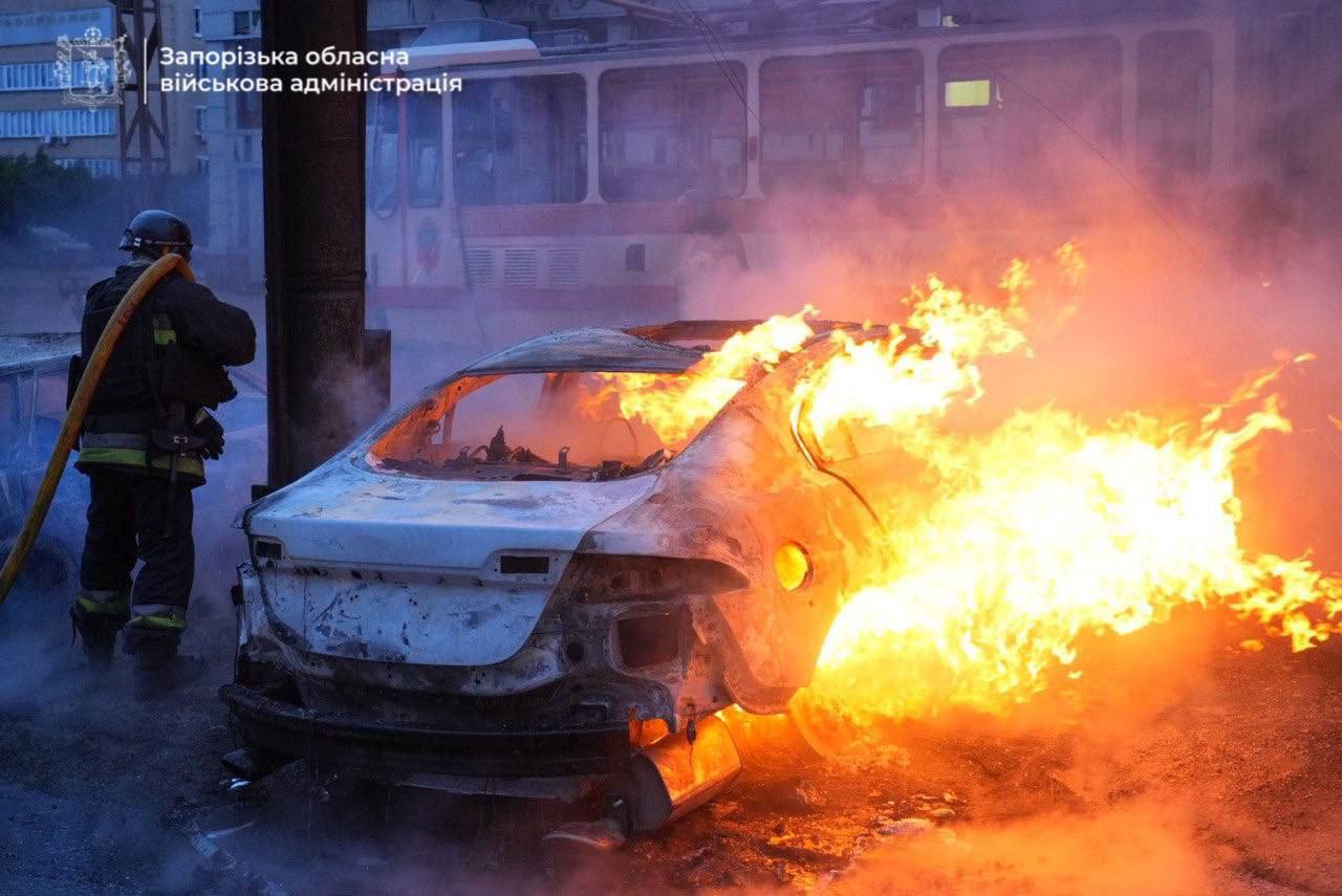 An image released by Ukrainian officials shows a car on fire after being hit by a Russian missile in Zaporizhzhia