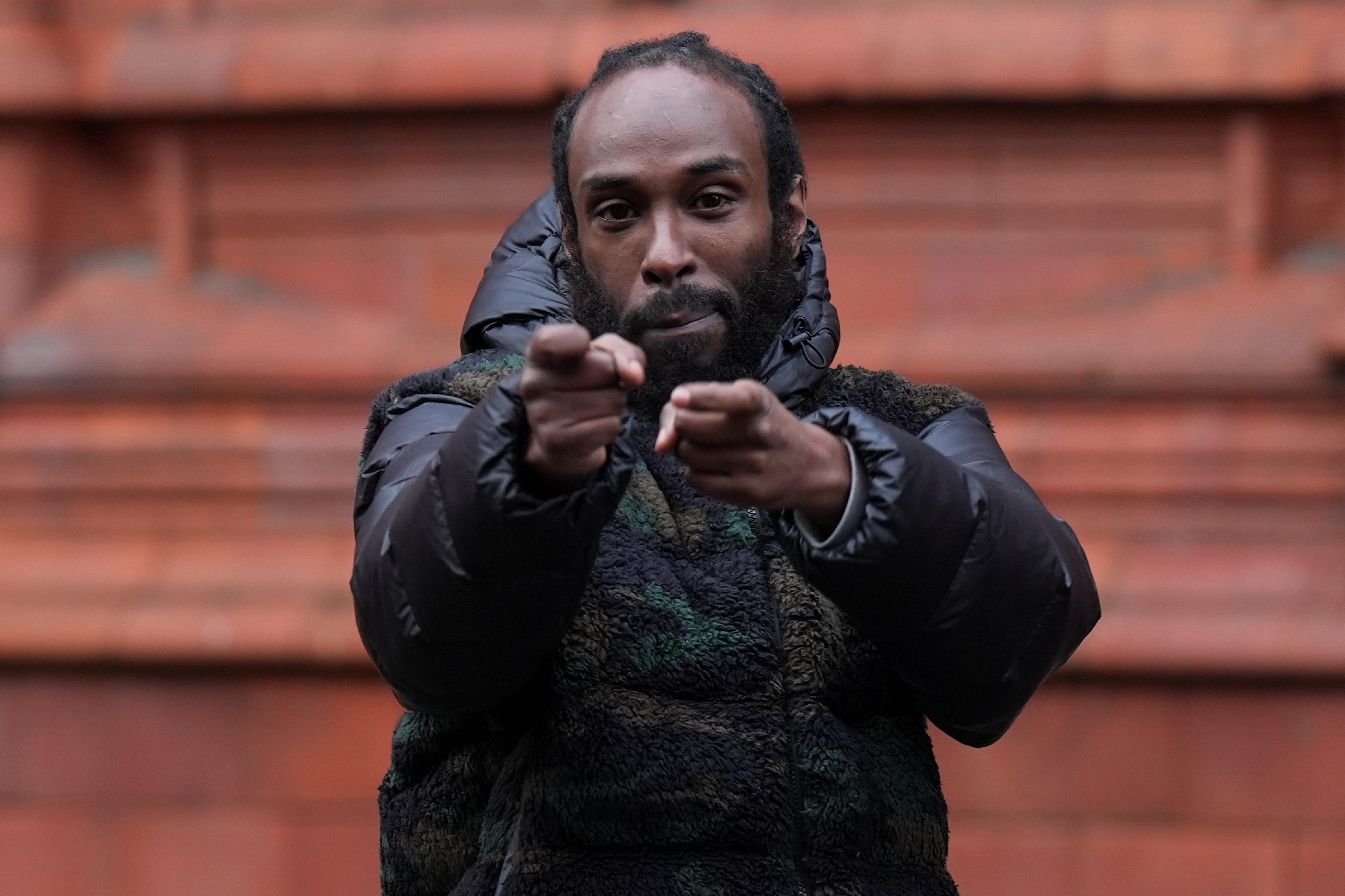 Omar Abdirizak, the rapper known as Twista Cheese, arriving at Birmingham Magistrates’ Court (Jacob King/PA)