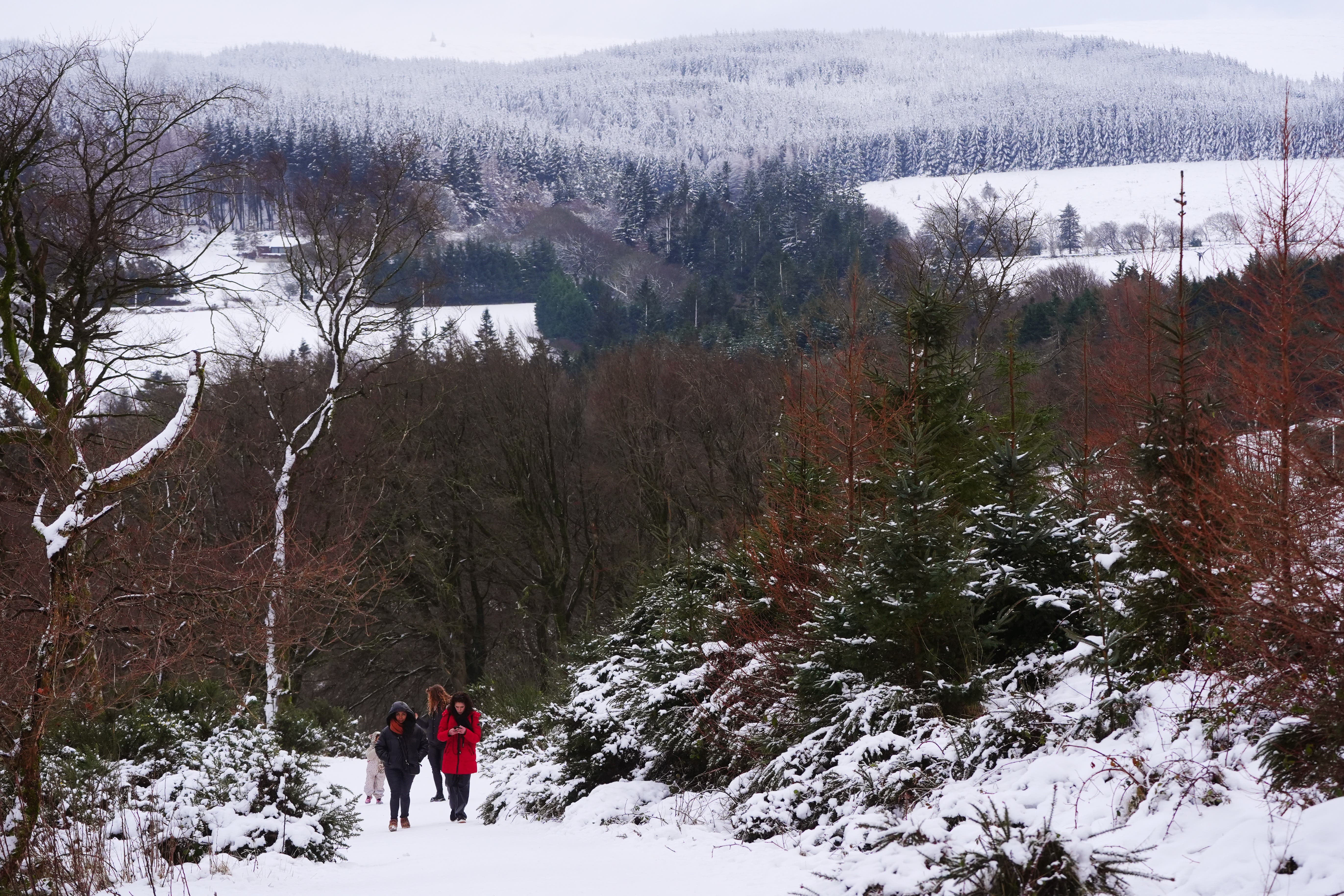 People walk up towards the Hell Fire club in Dublin ahead of a Status Orange low temperature warning issued for most counties on Wednesday night (Brian Lawless/PA)