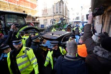 Angry farmers disrupt environment minister’s speech with loud tractor tax protest in Oxford