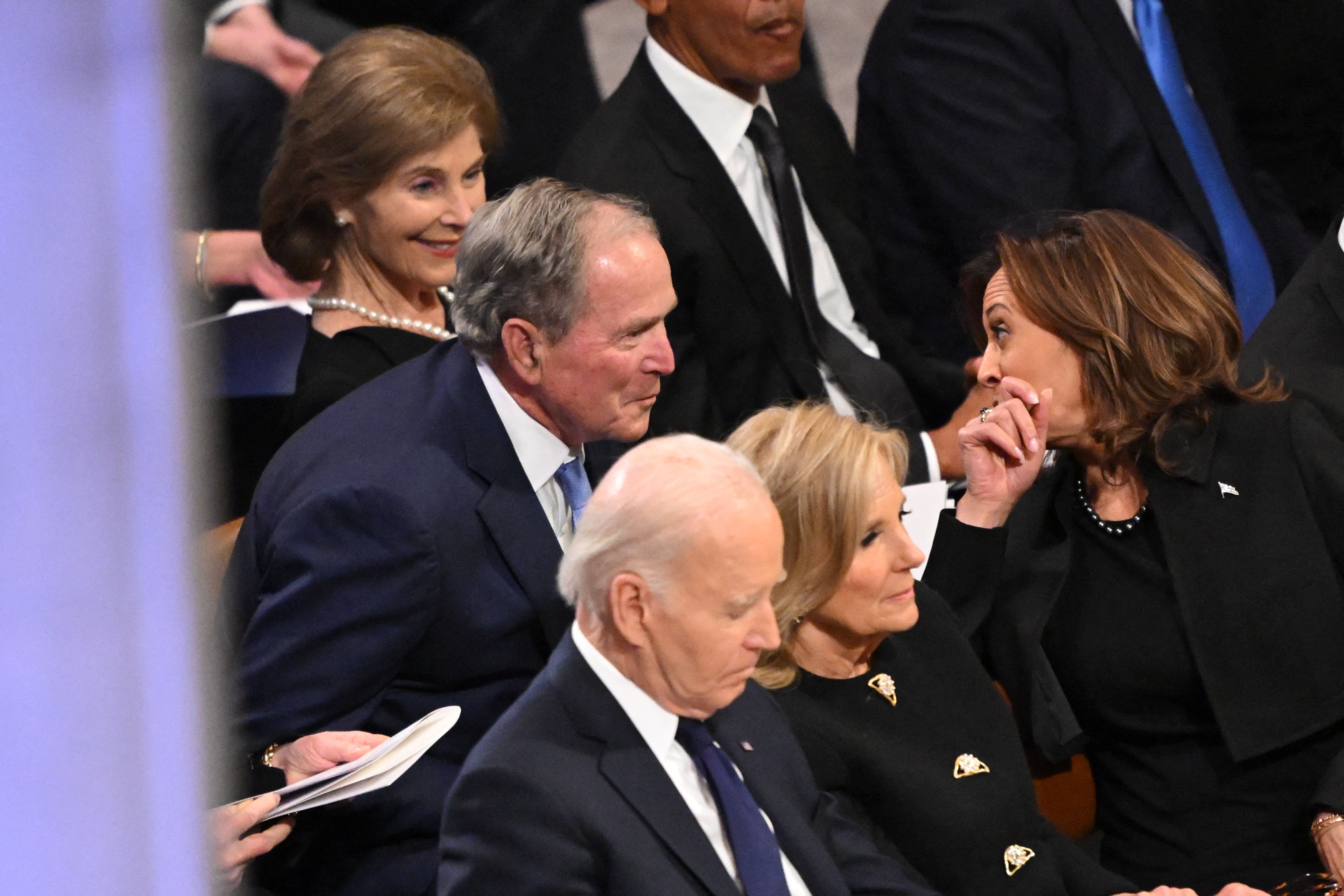 Vice President Kamala Harris shared a few words with former President George Bush towards the end of proceedings.