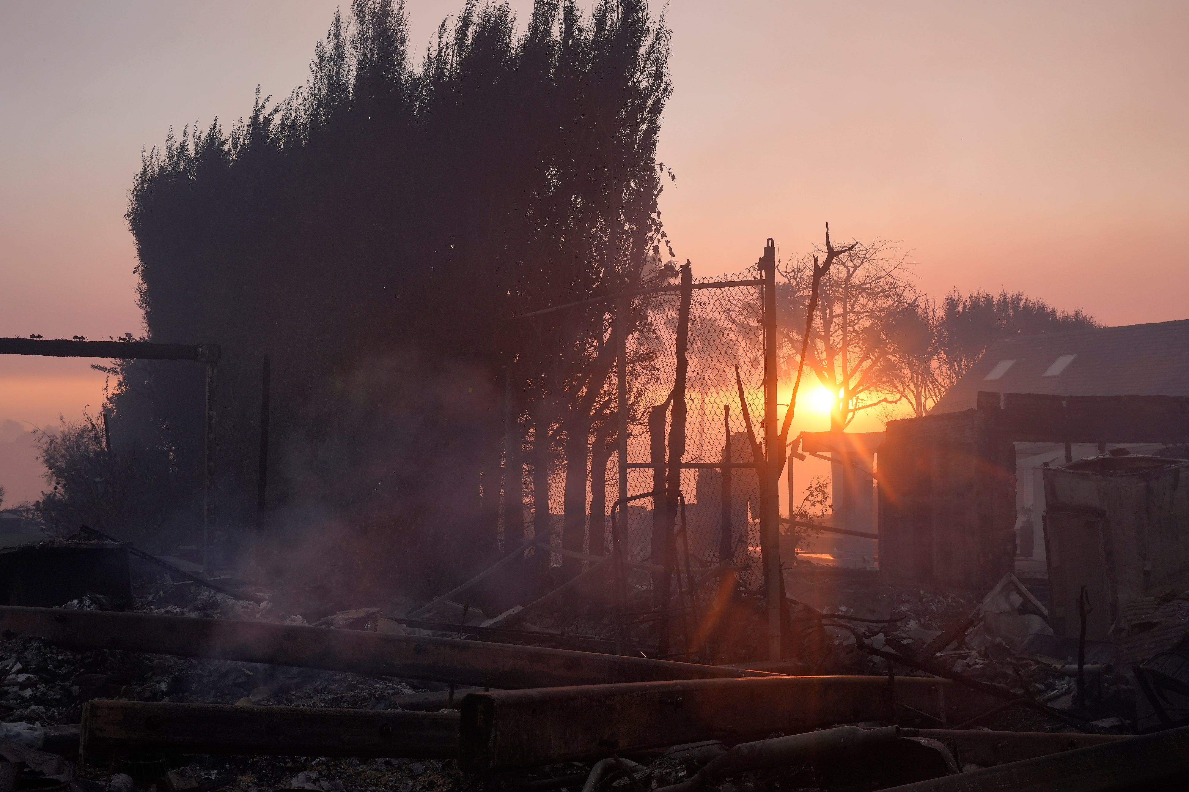 Debris covers the ground after the Palisades Fire in the Pacific Palisades neighborhood of Los Angeles, California, on Thursday. Thousands of homes and businesses were destroyed