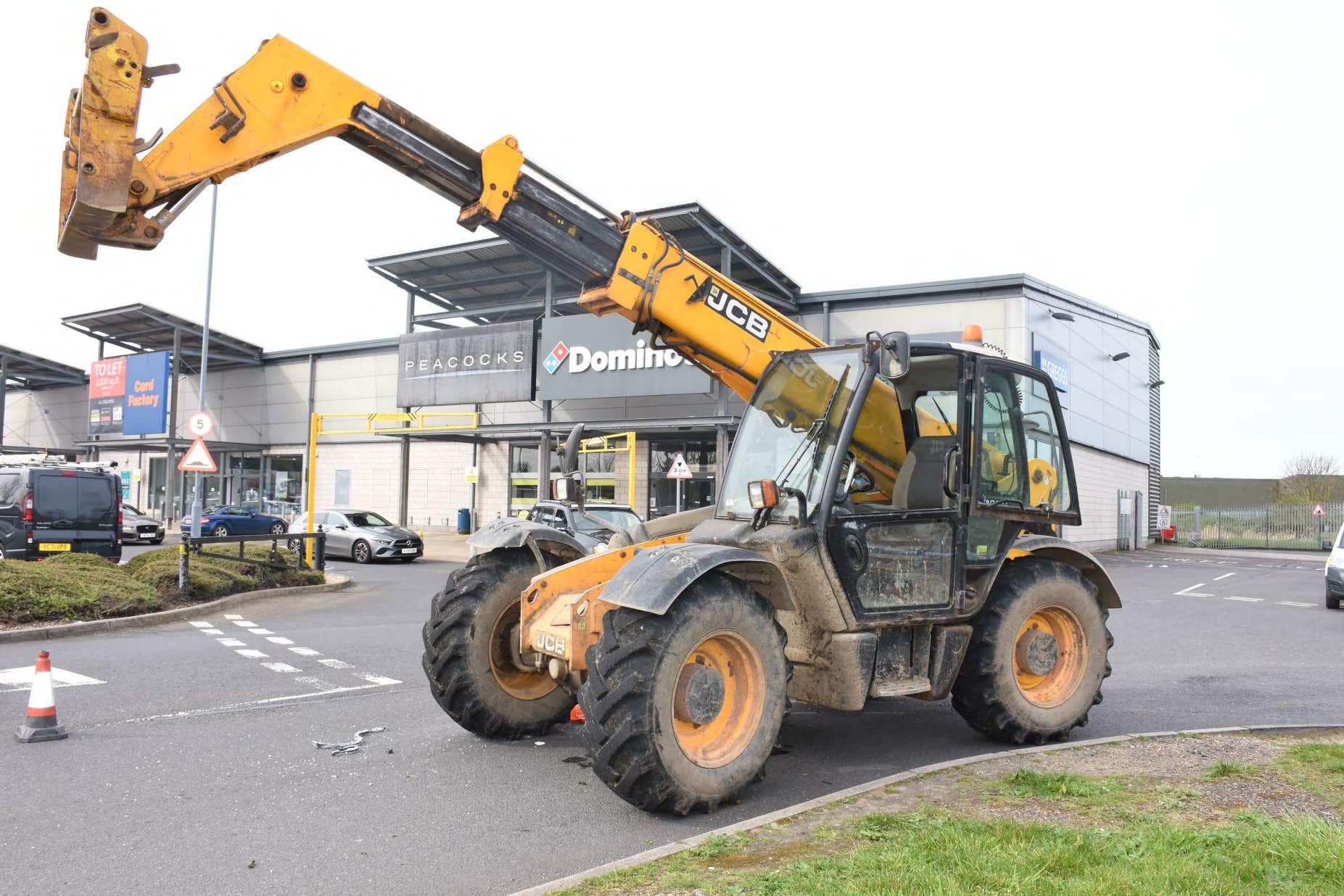 The JCB was left at the scene of the ram raid in Harwich, Essex (Essex Police/PA)