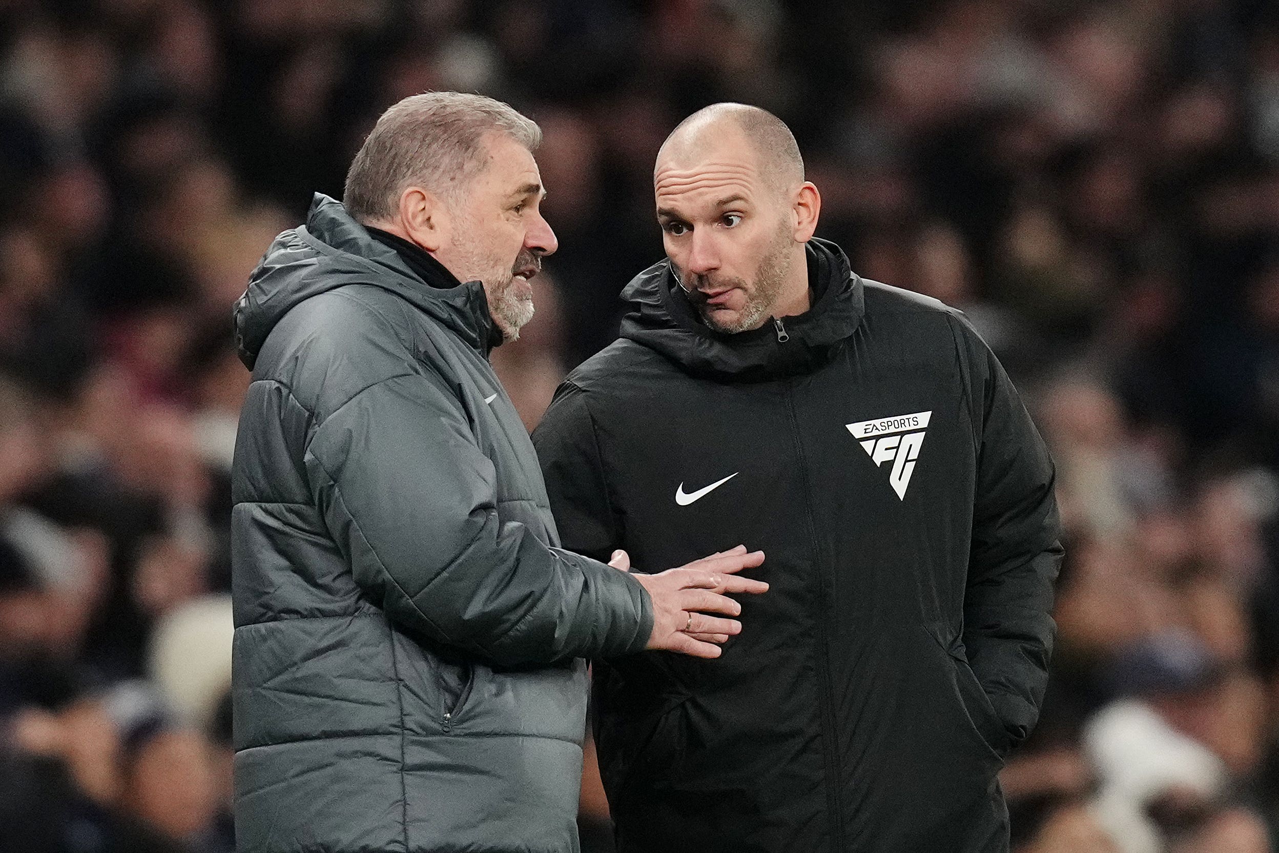 Ange Postecoglou (left) spoke to fourth official Tim Robinson during the cup clash with Liverpool (John Walton/PA)