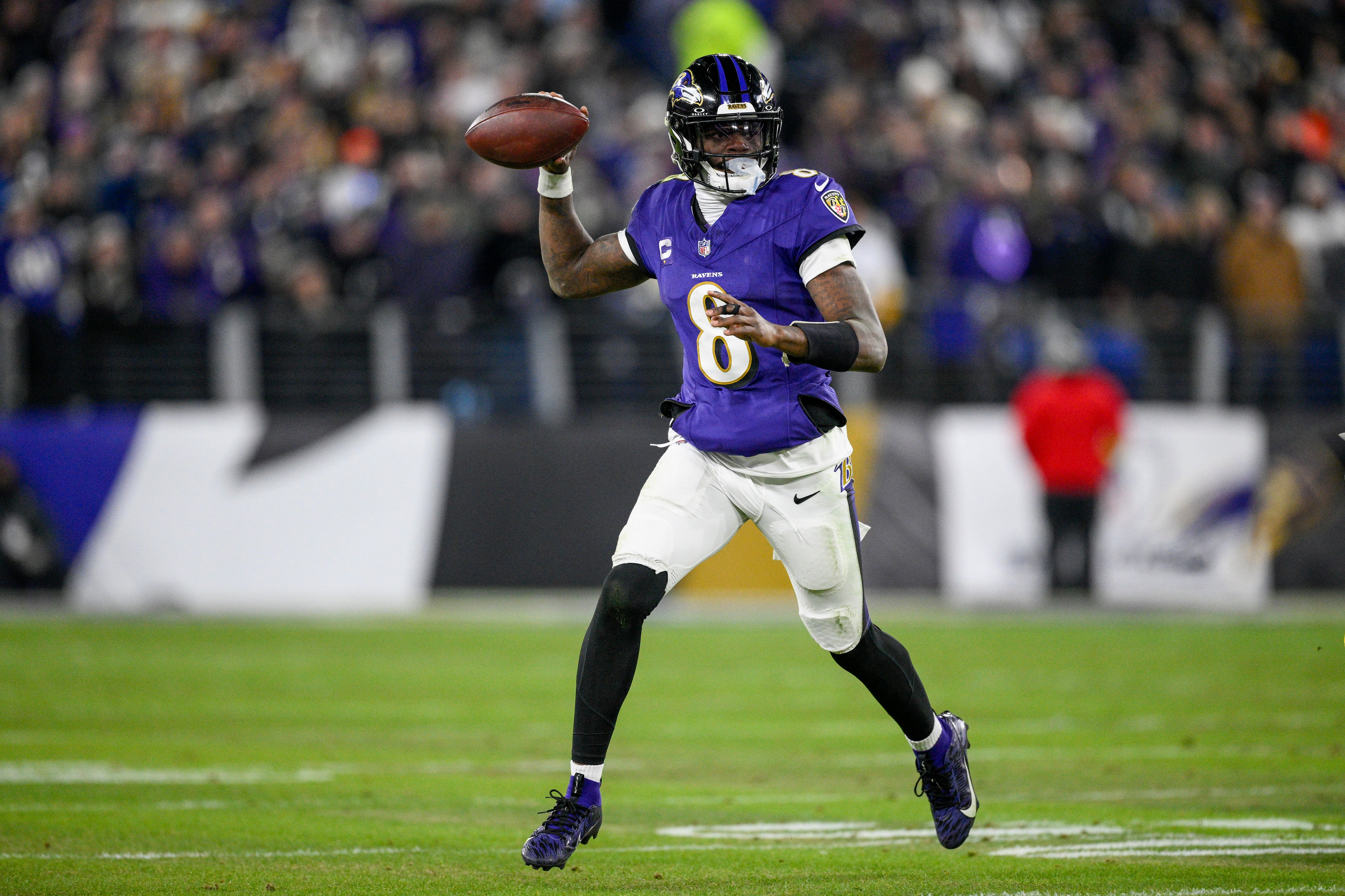 Baltimore Ravens quarterback Lamar Jackson looks to pass against the Pittsburgh Steelers (Nick Wass/AP)