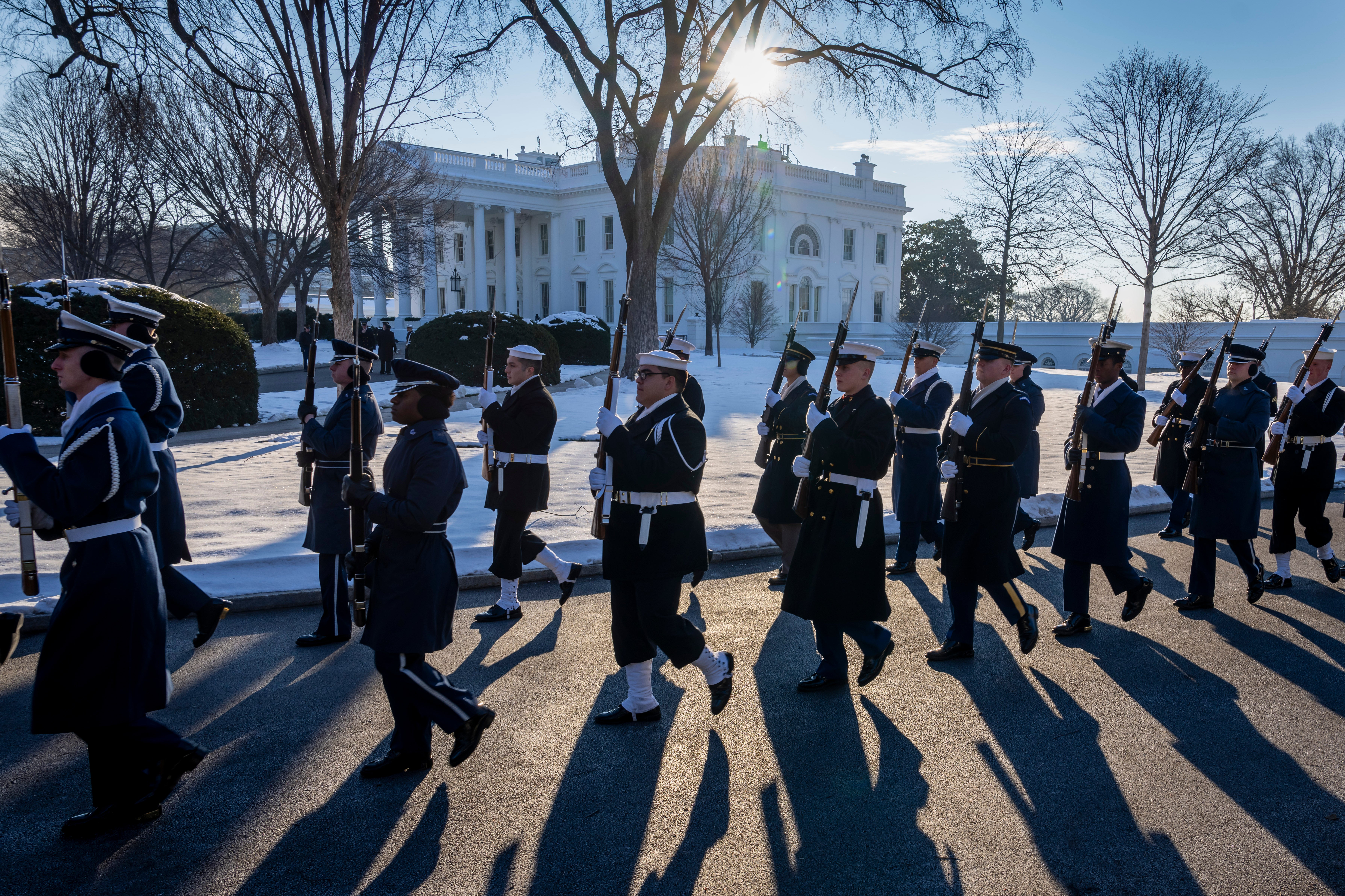 Members of the U.S. military Joint Honor Guard parade as they rehearse ahead of Trump’s innaugeration on January 12