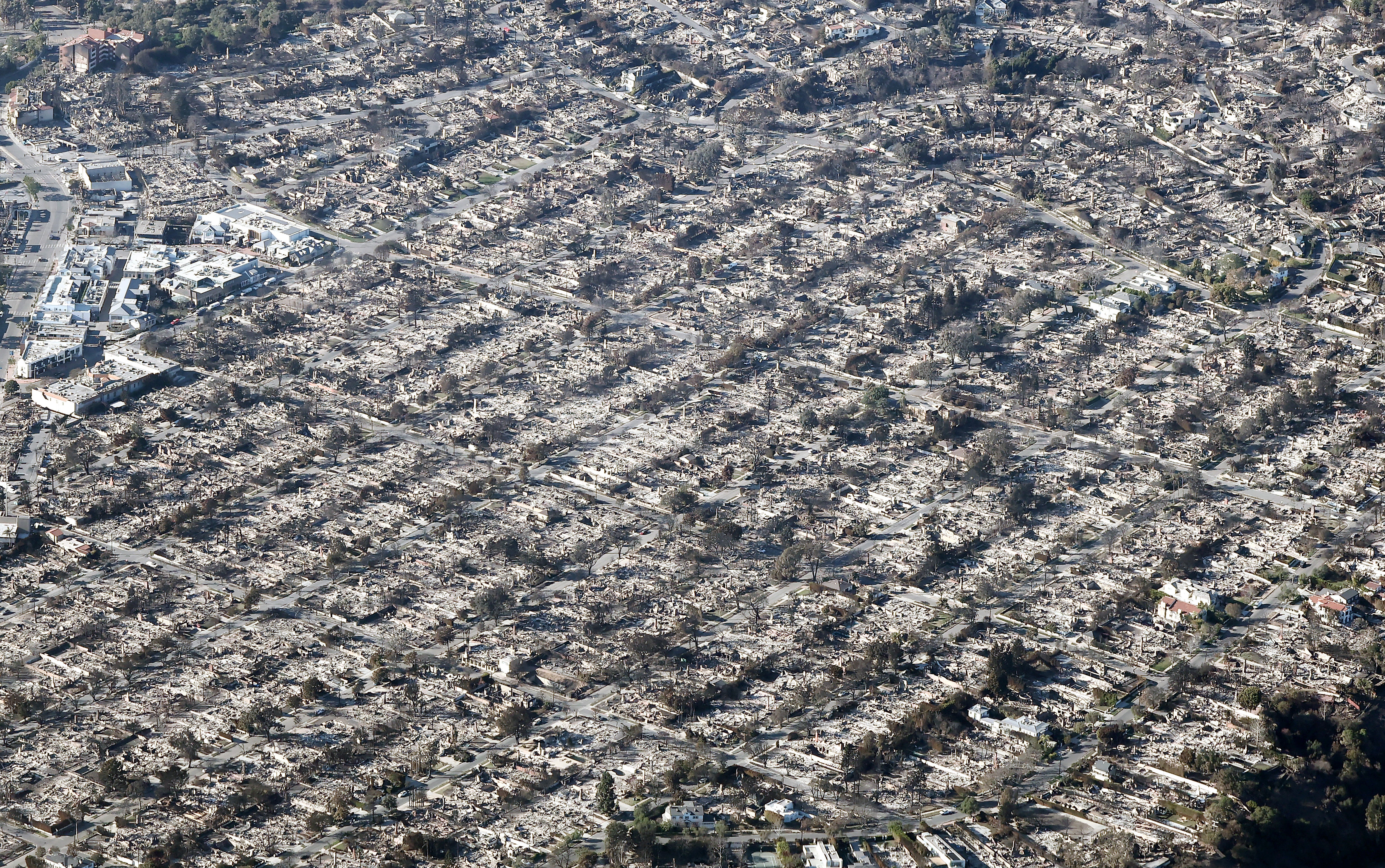 An aerial view of homes destroyed in the Palisades Fire