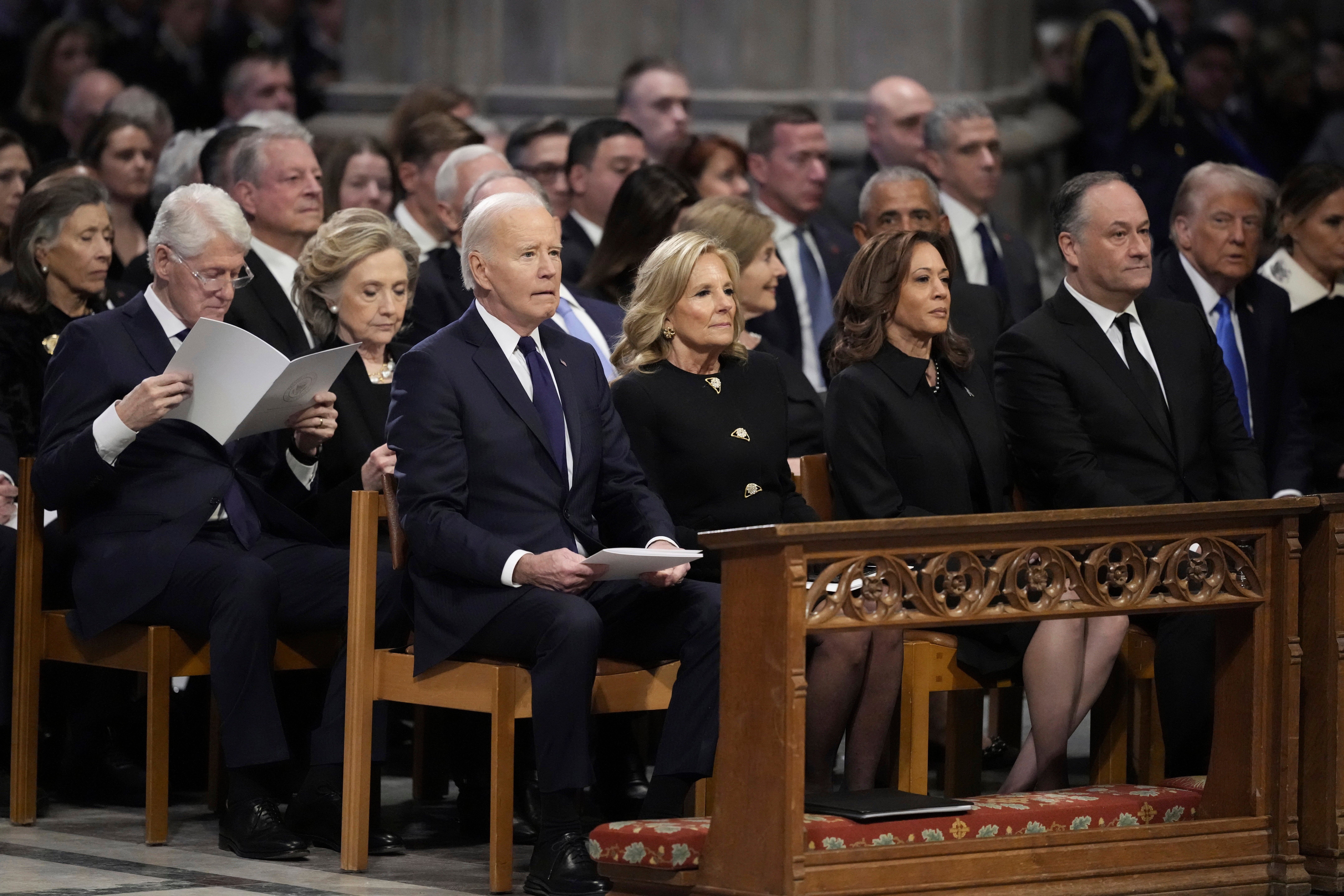 Trump appears at former President Jimmy Carter’s funeral. During an Oval Office meeting on Thursday, the president said that Carter ‘died a happy man’ knowing that Biden was a worse president than he was.