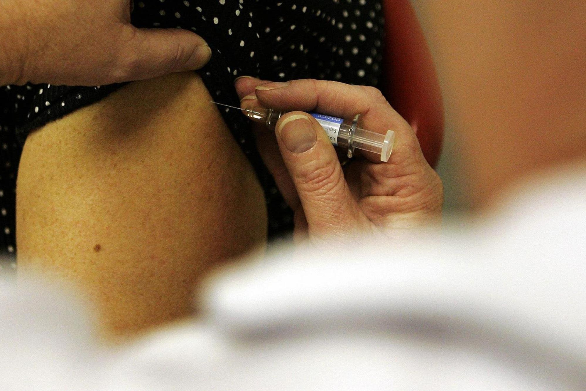 A lung health charity is calling on the Scottish Government to offer free flu jabs to people in their 50s, warning that the current flu season has left hospitals across the country at ‘breaking point’ (Andrew Milligan/PA)