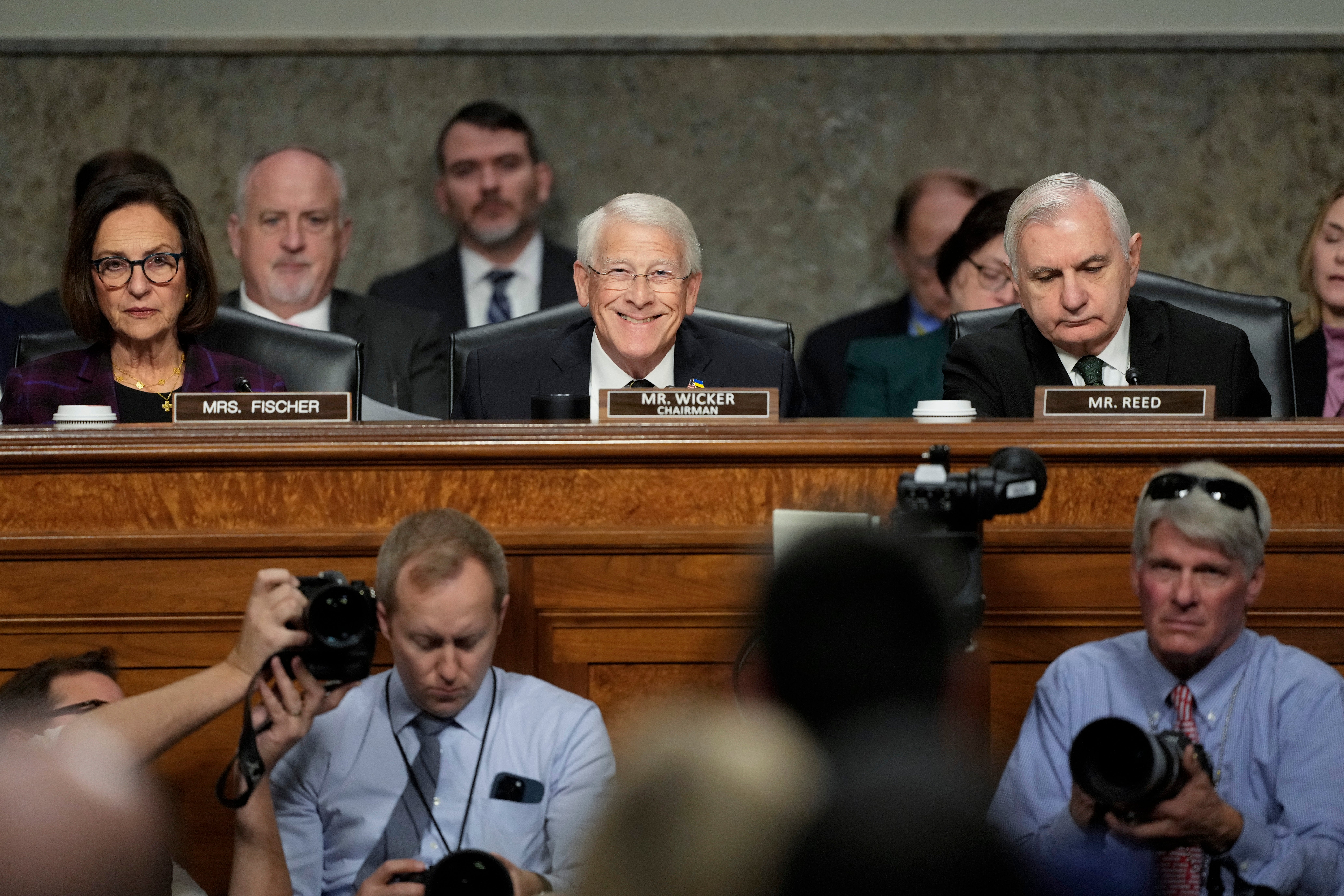 Sen. Deb Fischer, R-Neb., left, Committee chairman Sen. Roger Wicker, R-Miss., center, and Sen. Jack Reed, D-R.I., all questioned Hegseth during his confirmation hearing on Tuesday