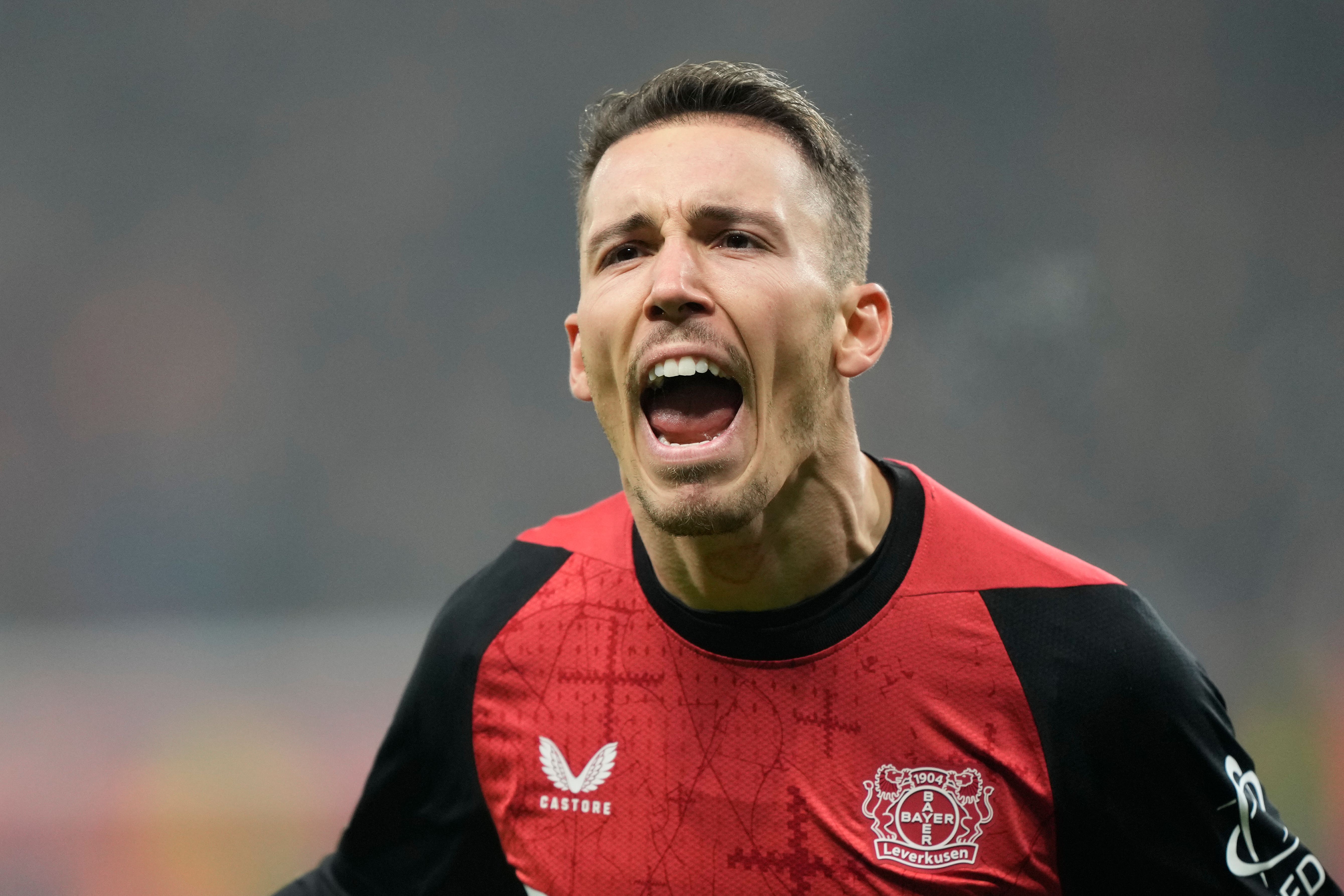 Alex Grimaldo scored Bayer Leverkusen’s winner as they moved within a point of Bundesliga leaders Bayern Munich (Martin Meissner/AP)