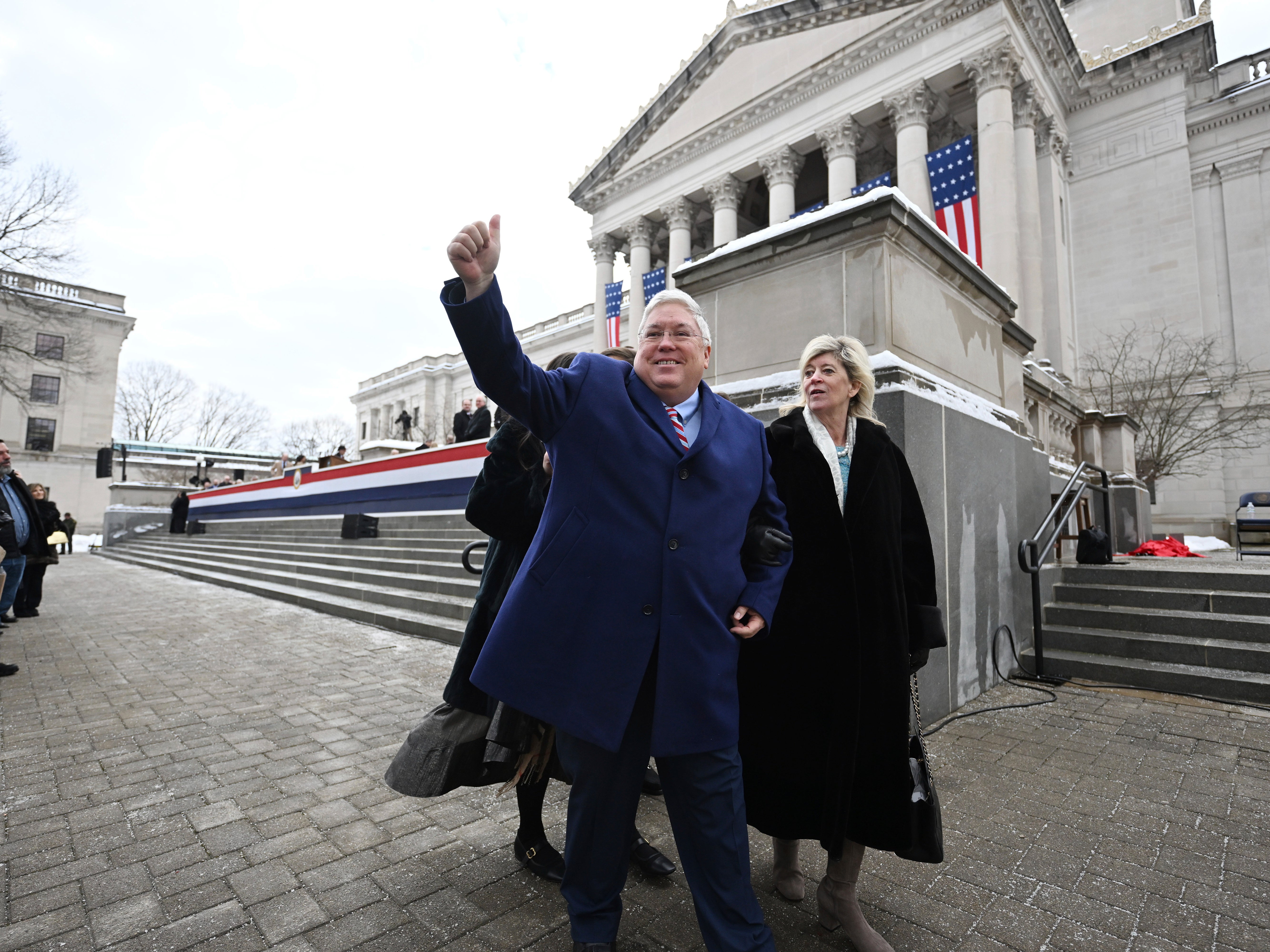West Virginia Governor Patrick Morrisey and his wife, Denise, greet people following his swearing-in at the state capitol in Charleston on Monday January 13 2025