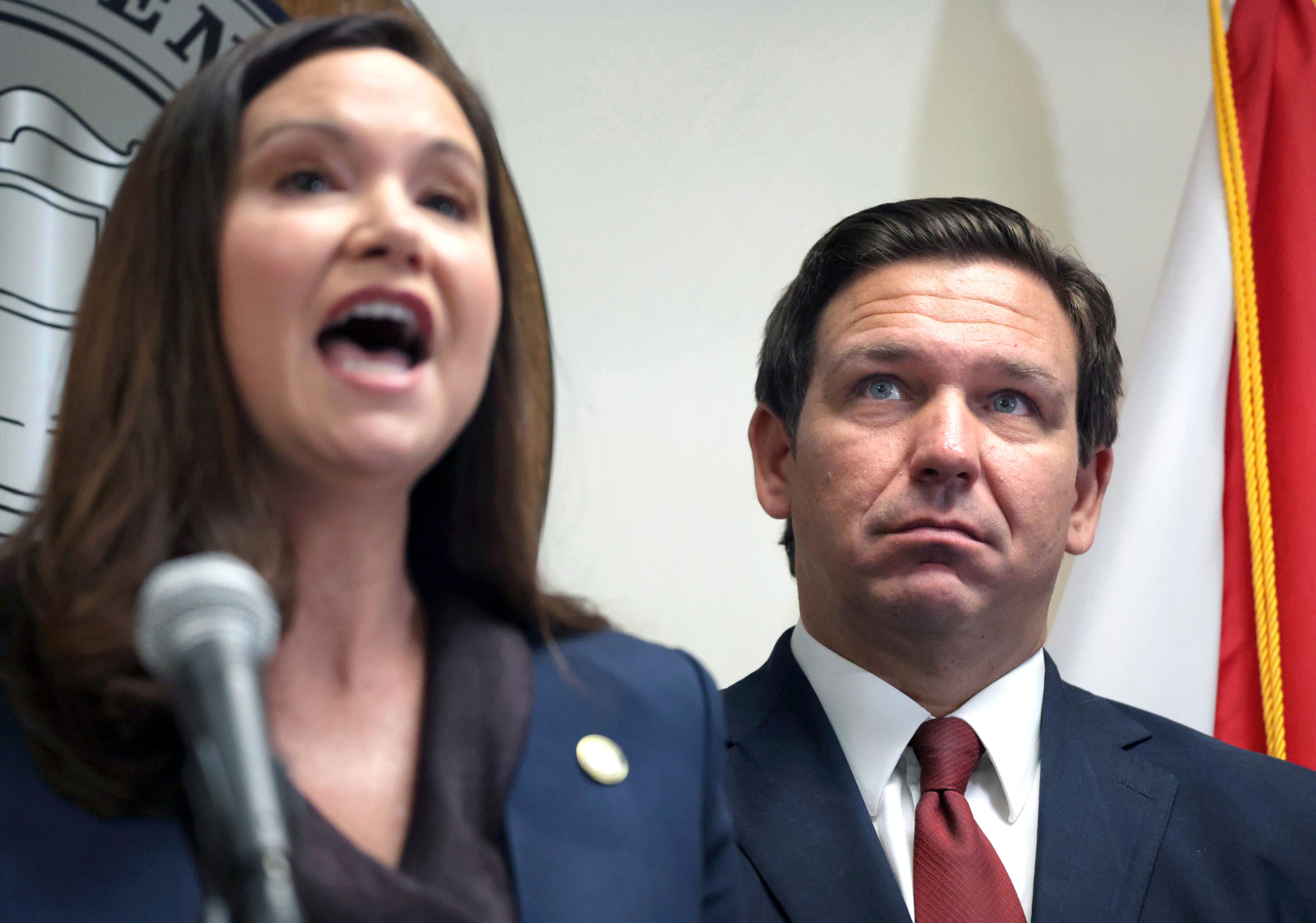 Moody, pictured alongside DeSantis, at a press conference in 2021. The two have worked closely together since rising to prominence in the state