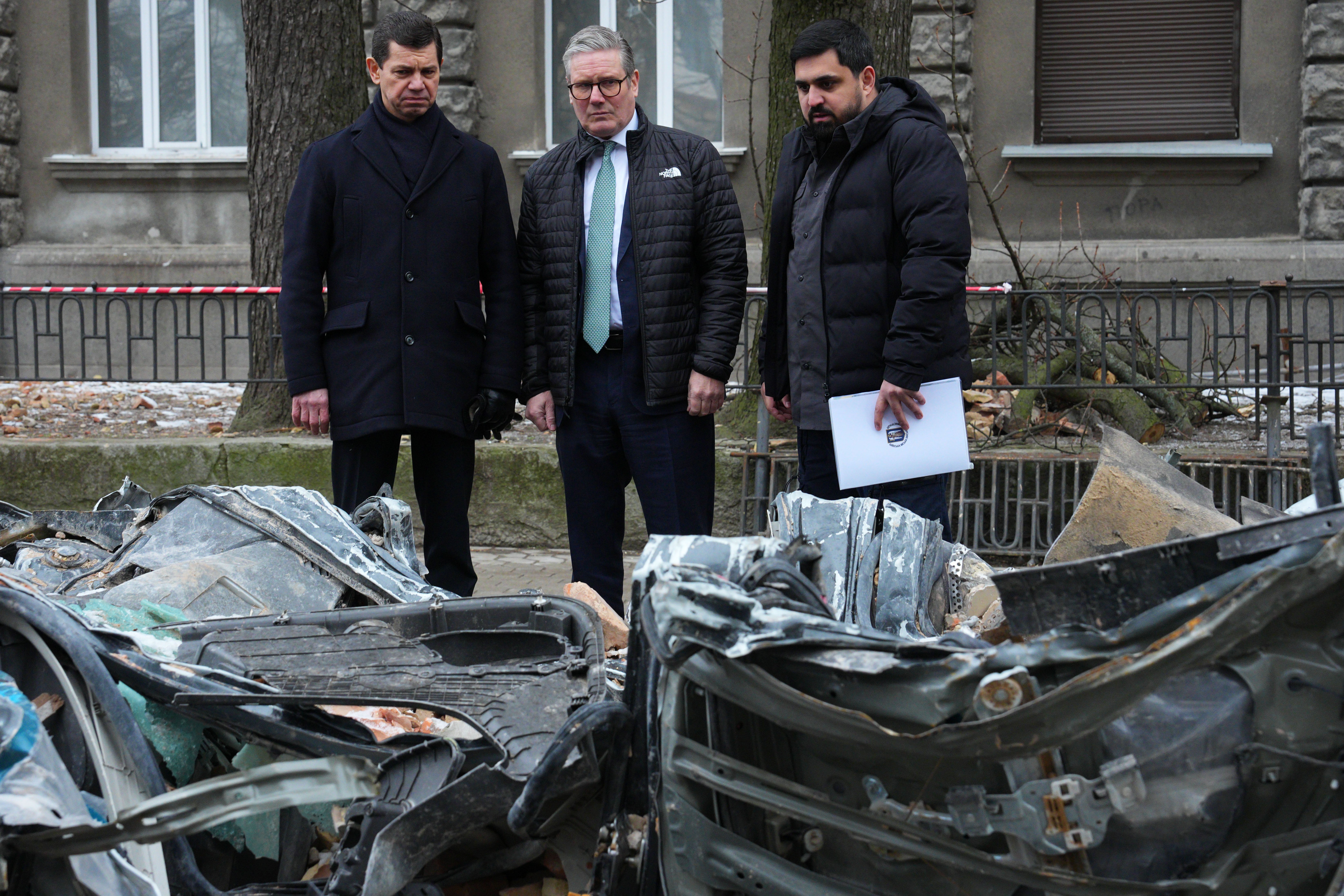 Sir Keir examines a vehicle damaged in a recent drone attack in Kyiv