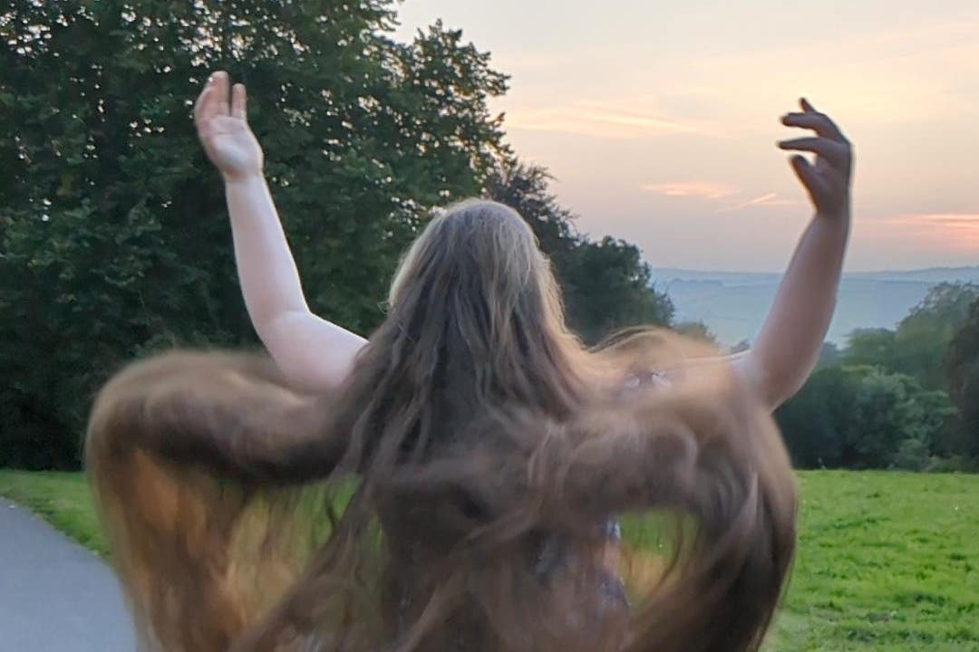A woman has earned a world record for the longest hair donation (LPT/PA)