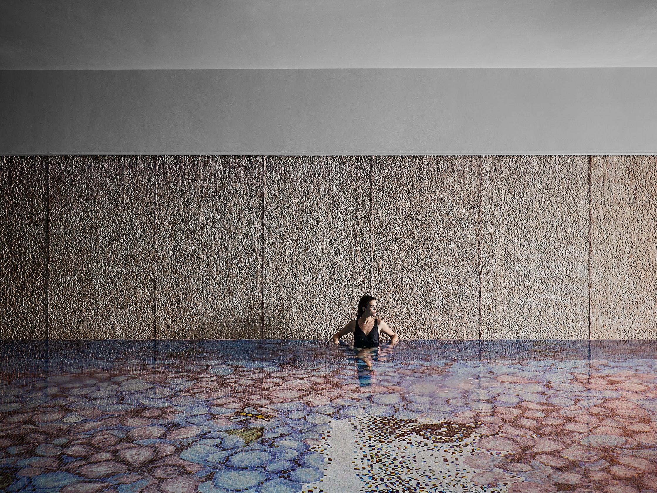 The indoor pool at L’Albereta in northern Italy’s Lombardy region is covered in 600,000 bisazza mosaic tiles