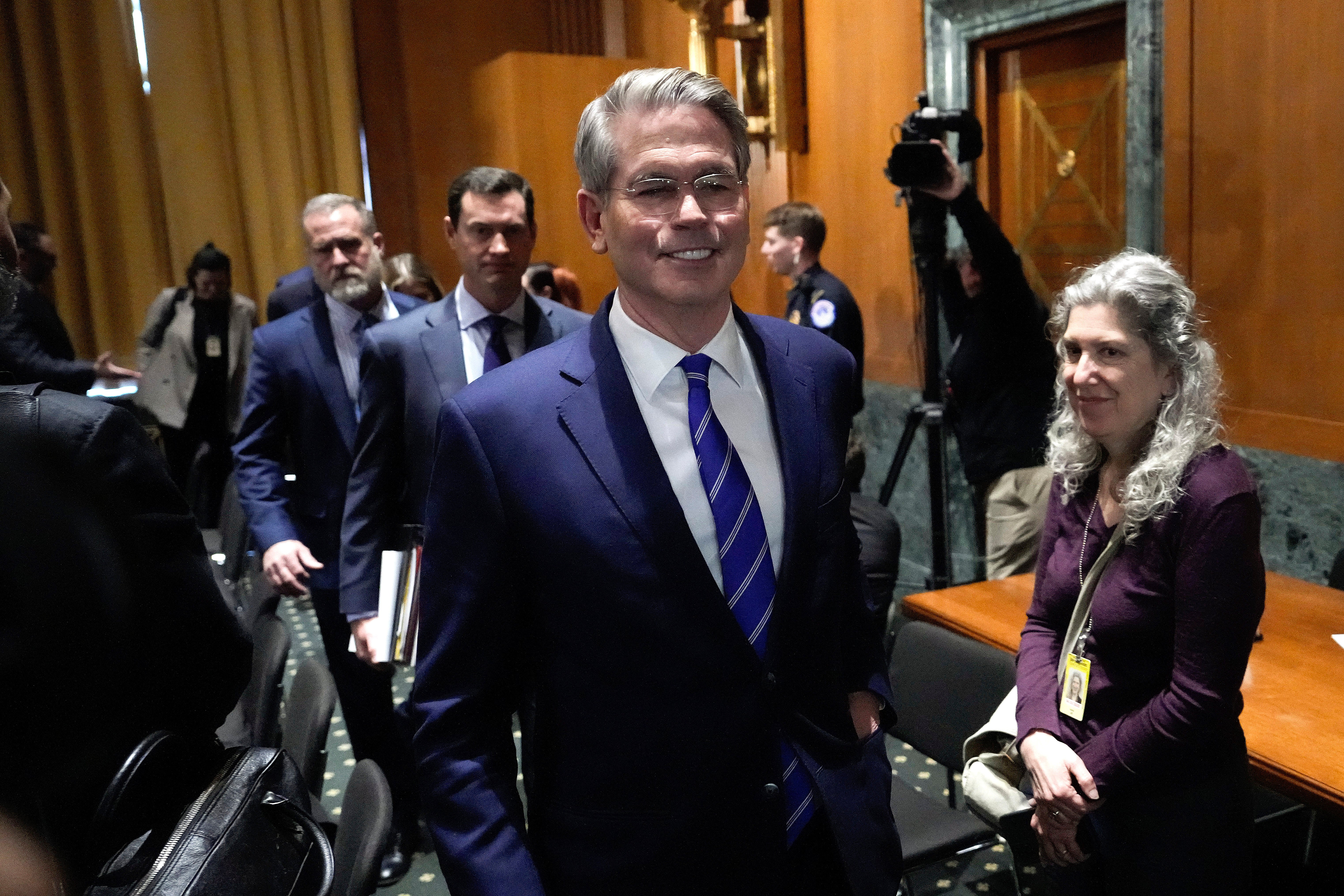 Treasury Secretary Scott Bessent leaves after his confirmation hearing at the Capitol