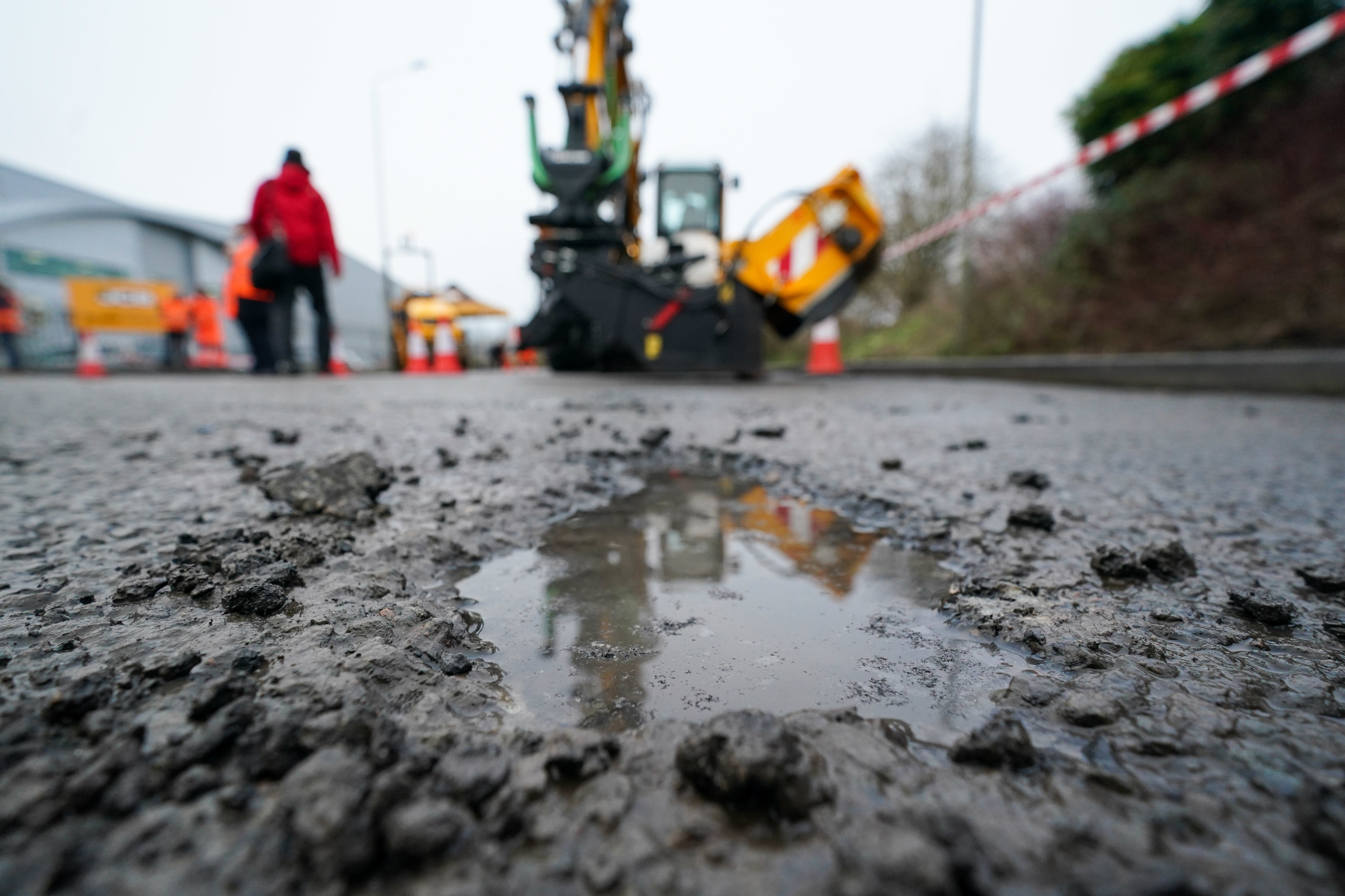 Labour promised to ‘fix an additional one million potholes across England in each year of the next parliament’ (Jacob King/PA)