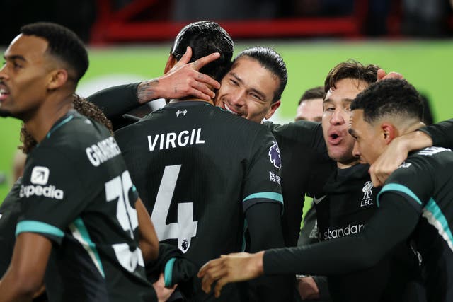 <p>Darwin Nunez (centre) came up with two goals off the bench to save Liverpool at Brentford</p>