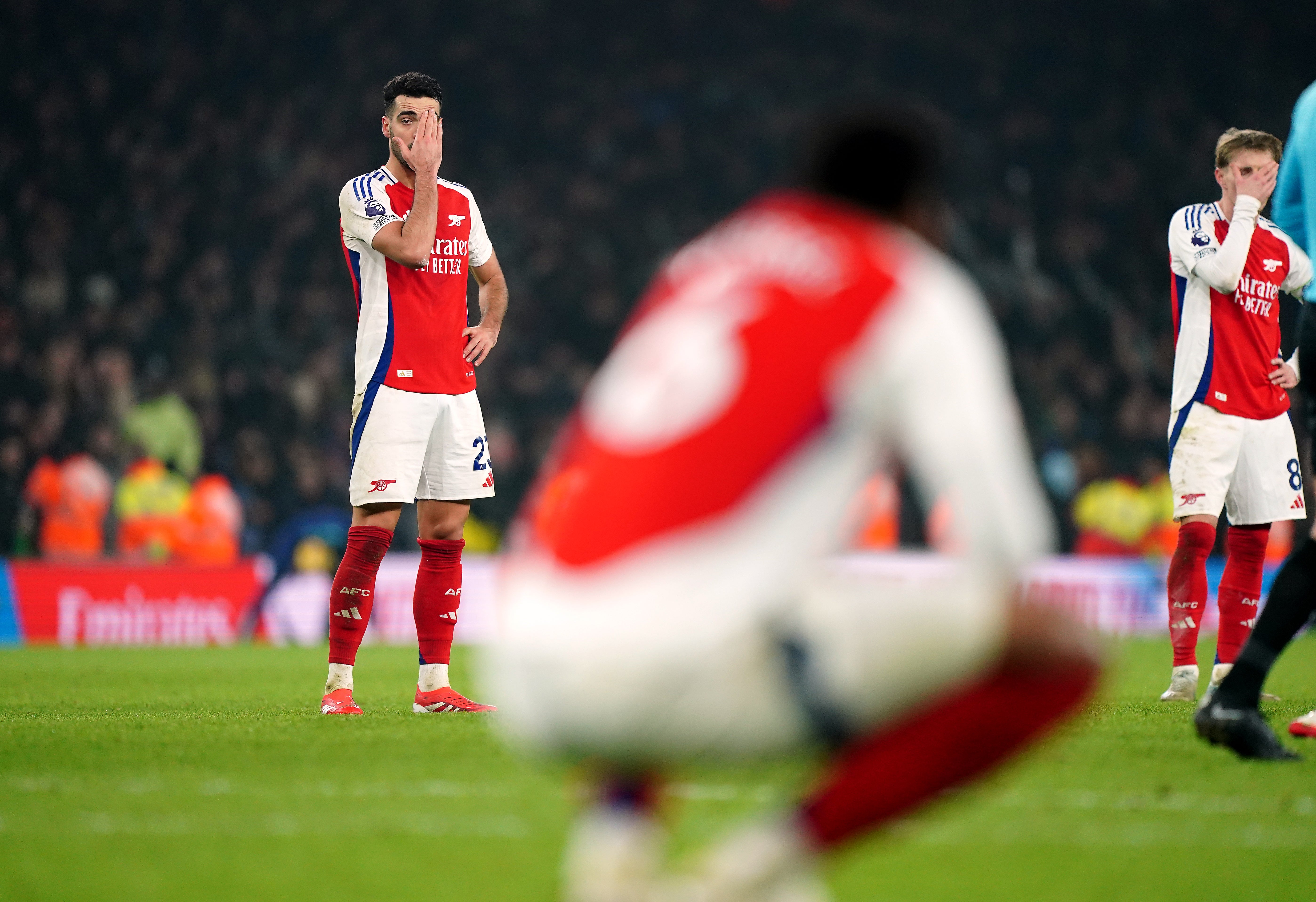 Arsenal players reflect on the draw at full-time after letting a two-goal lead slip away