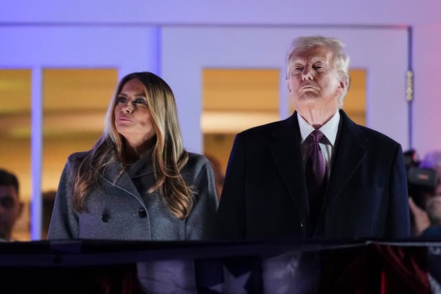 <p>President-elect Donald Trump, right, and Melania Trump watch fireworks at Trump National Golf Club in Sterling, Va., Saturday, Jan. 18, 2025</p>