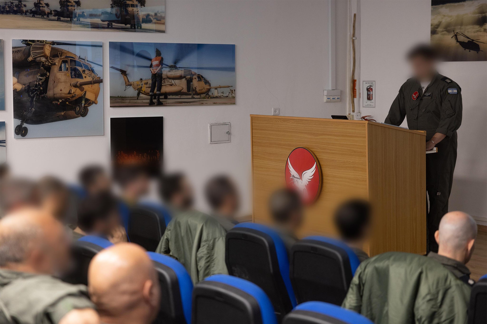 Photos of the IAF staff being briefed ahead of the hostage return