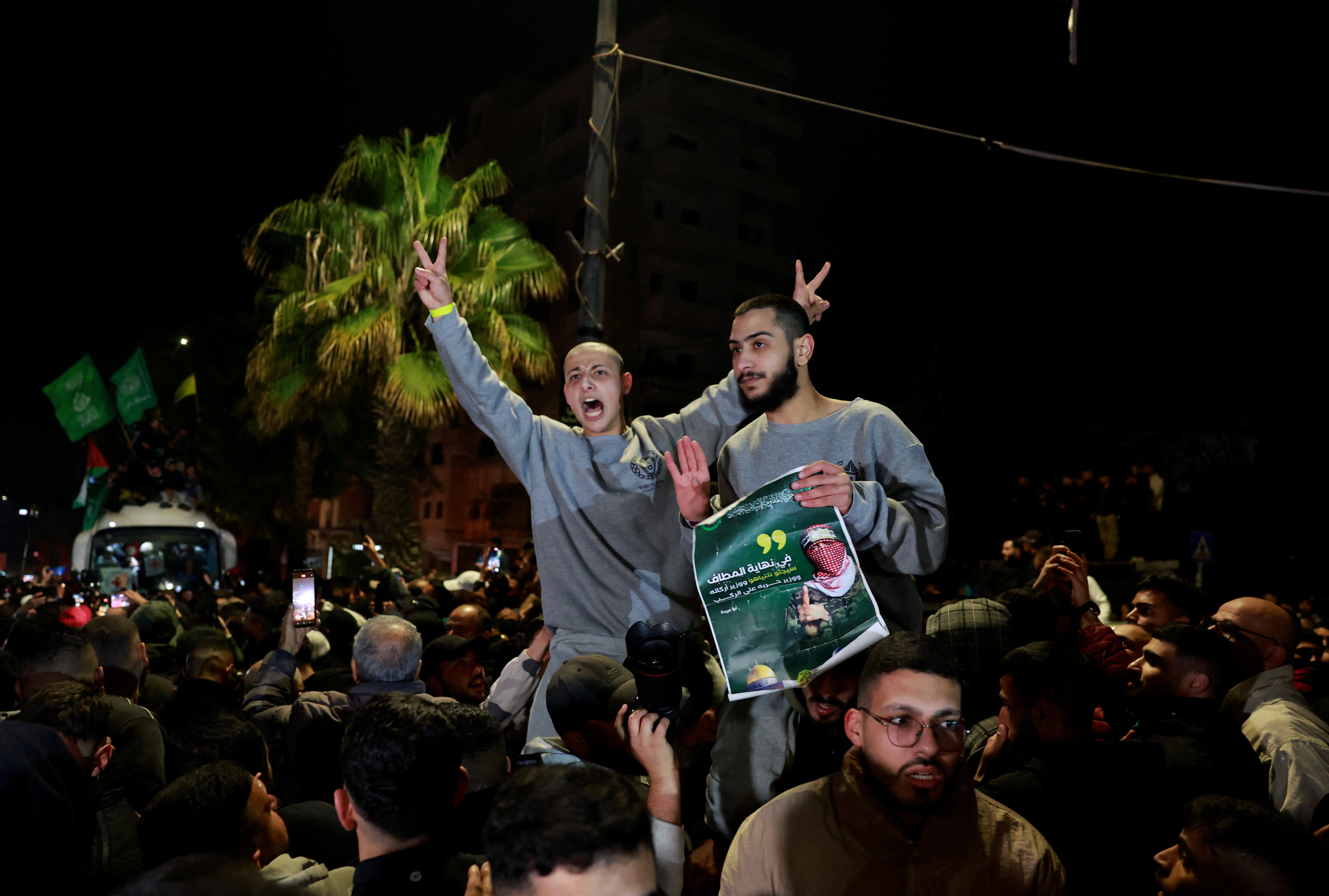 Freed Palestinian prisoners are carried aloft after being released from an Israeli jail as part of a hostages-prisoners swap and a ceasefire deal in Gaza between Hamas and Israel