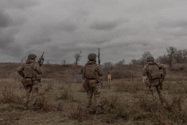 <p>Ukrainian soldiers of the 1st Separate Assault Battalion Da Vinci take part in a shooting exercise as they train in the Dnipropetrovsk region</p>