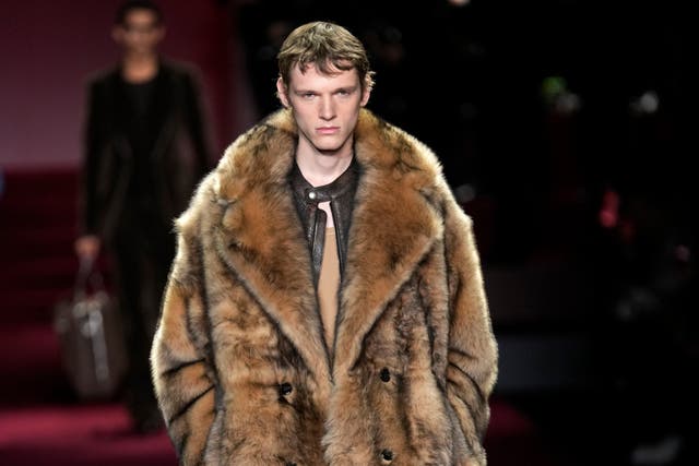 Fur coats and old-school glamour dominated Milan Men’s Fashion Week (Luca Bruno/AP)