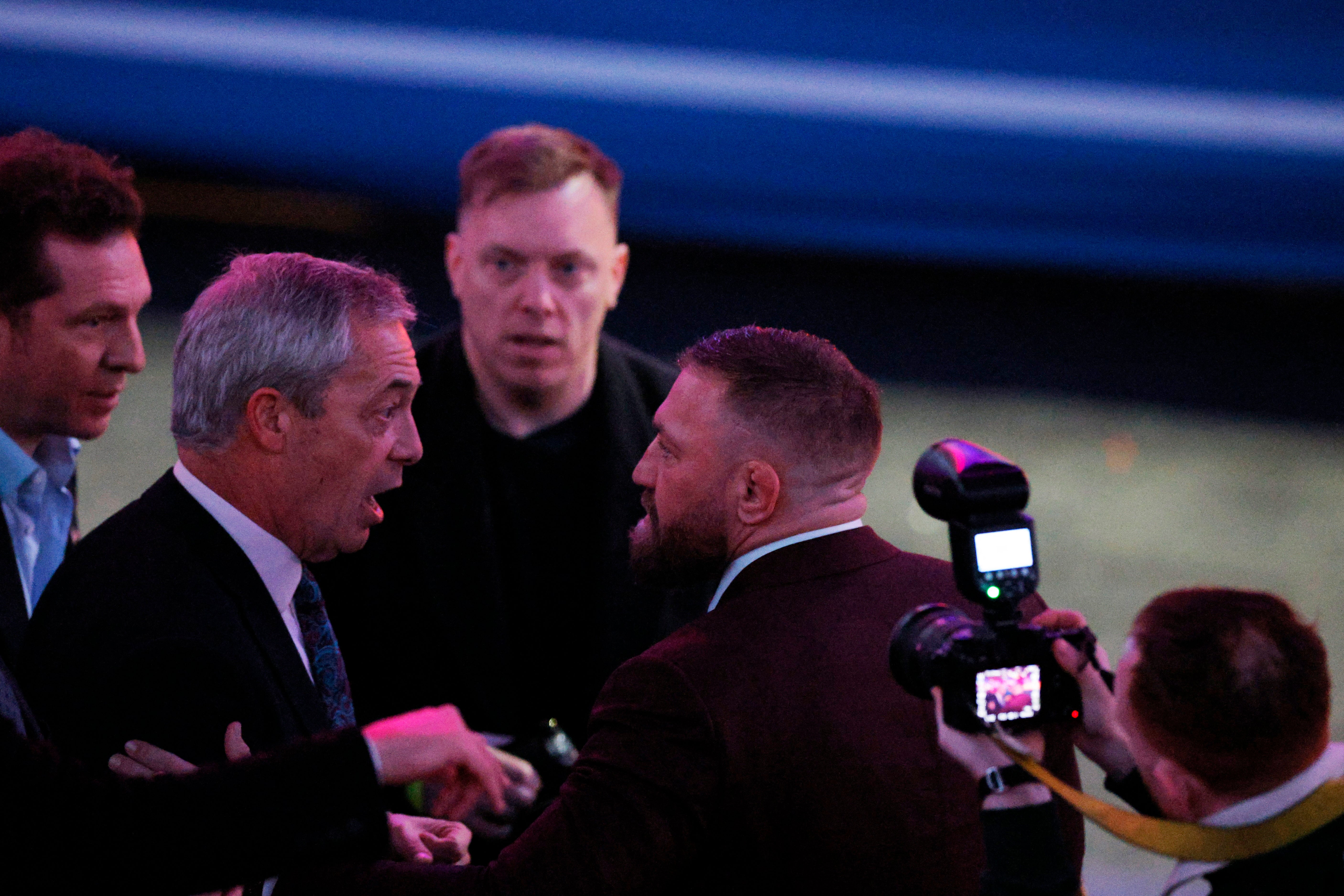 McGregor and Mr Farage speak during a rally in Washington