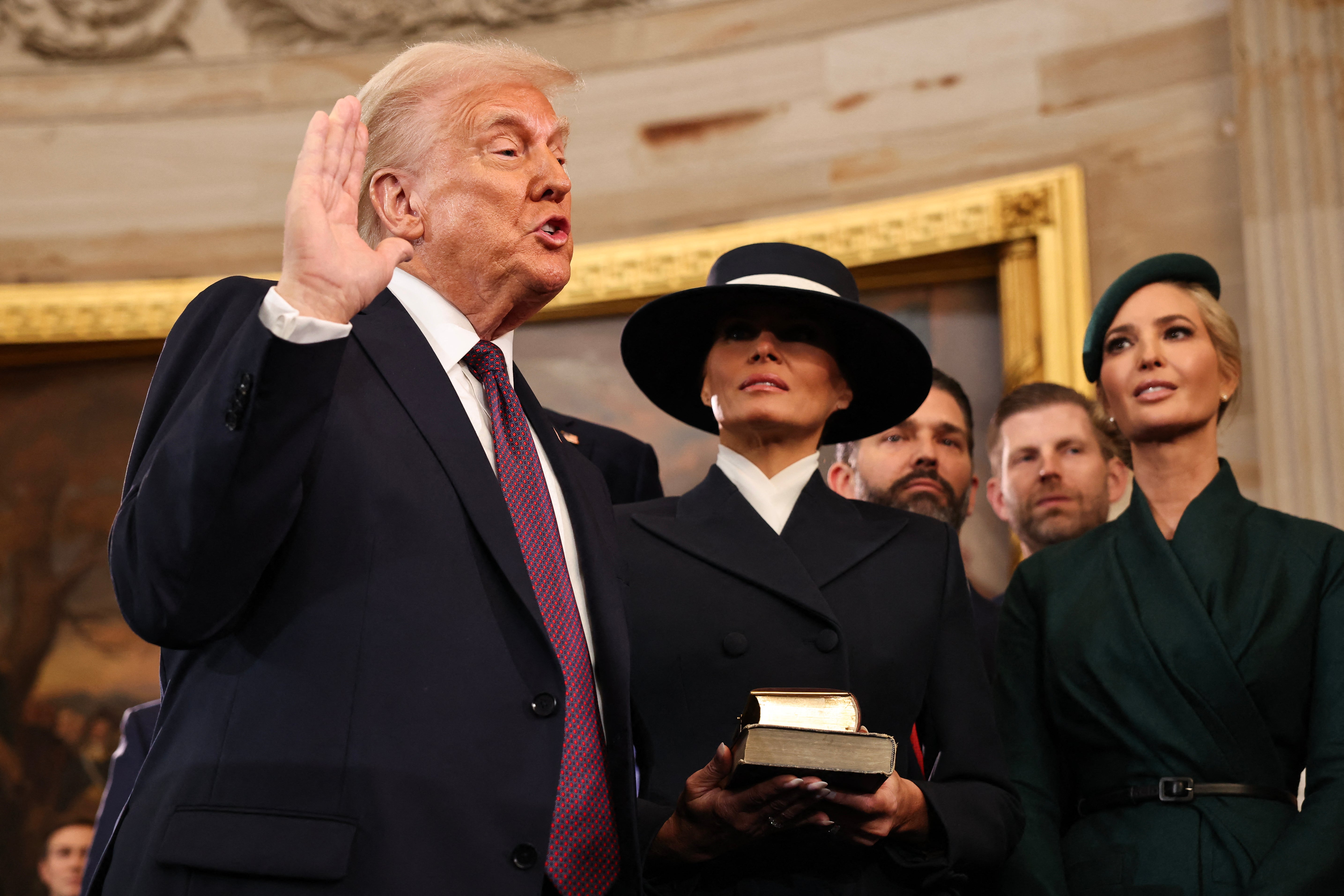 Ivanka Trump next to President Donald Trump and First Lady Melania Trump at the 2025 Inauguration swearing-in ceremony