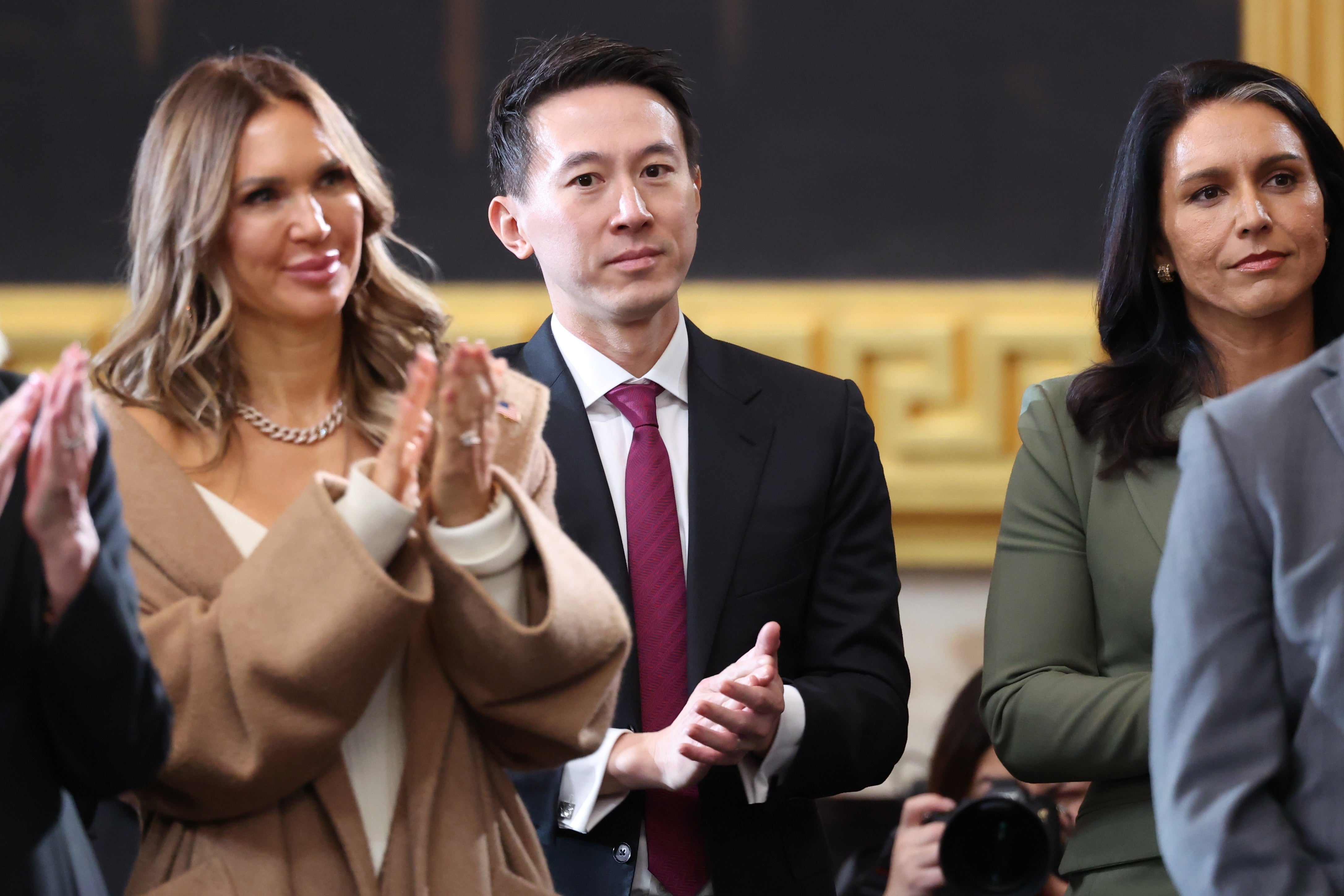 TikTok CEO Shou Zi Chew in the middle, with Tulsi Gabbard to the right