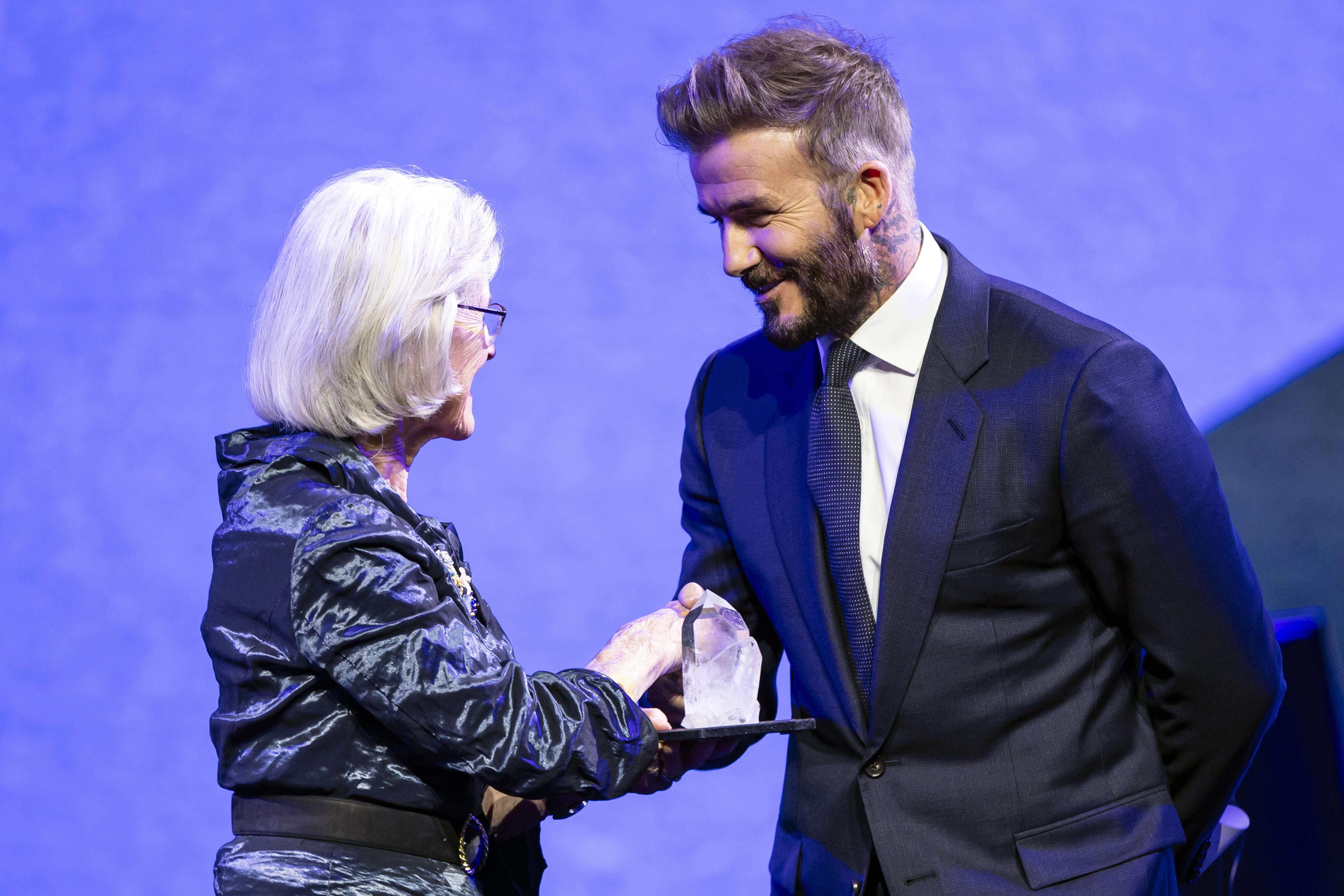 The ex-England footballer was honoured with a Crystal Award at the annual World Economic Forum meeting in Switzerland