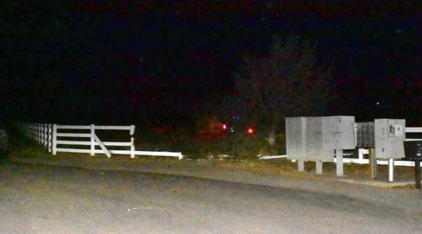 The men shot at the truck which caused the driver to crash through a fence