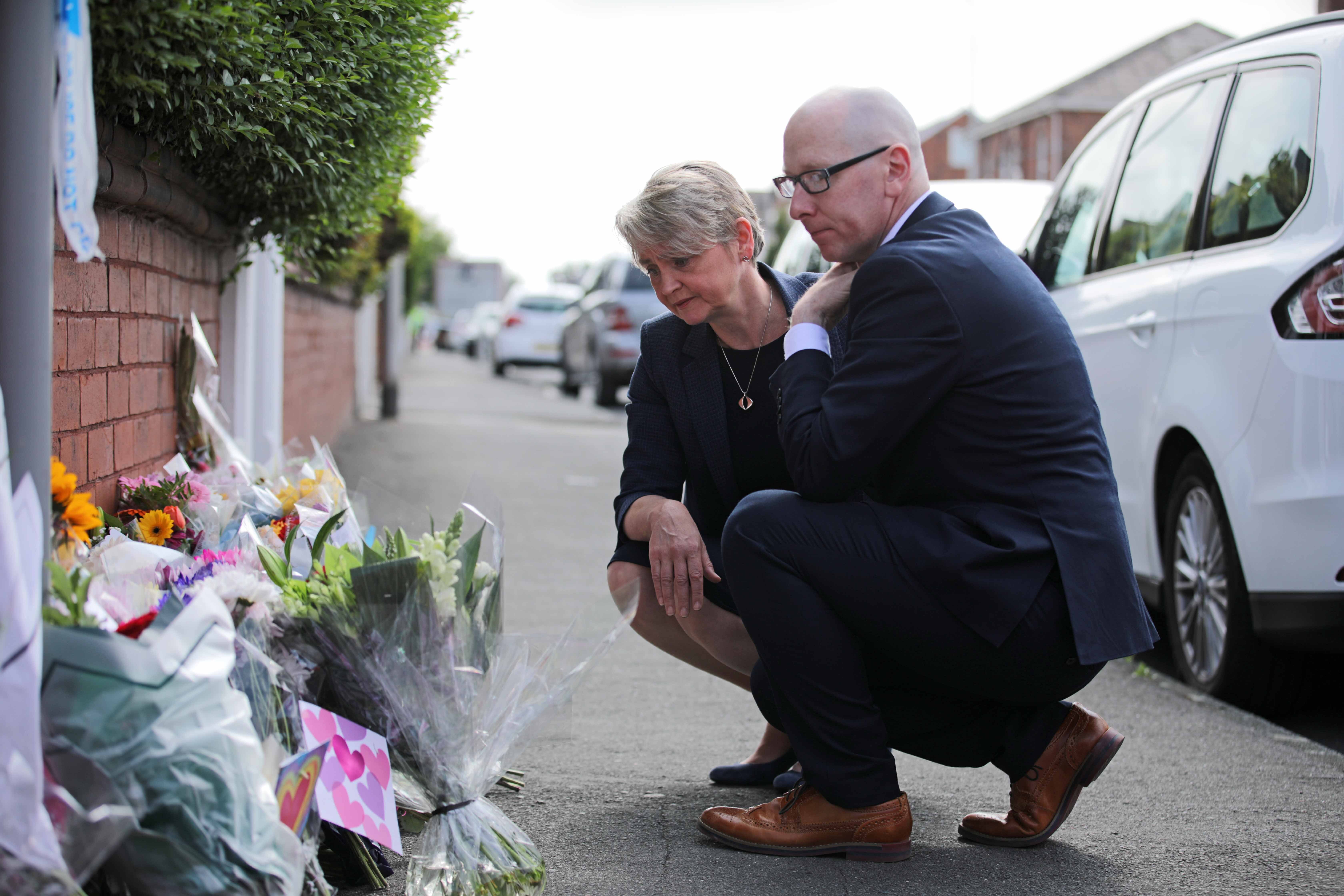 Home secretary Yvette Cooper and Mr Hurley pictured leaving flowers as a tribute to Alice da Silva Aguiar, Bebe King and Elsie Dot Stancombe