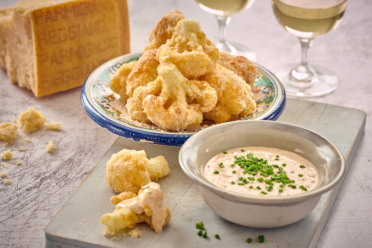 The ultimate crowd-pleaser – crisp, golden bites with a creamy parmesan dip
