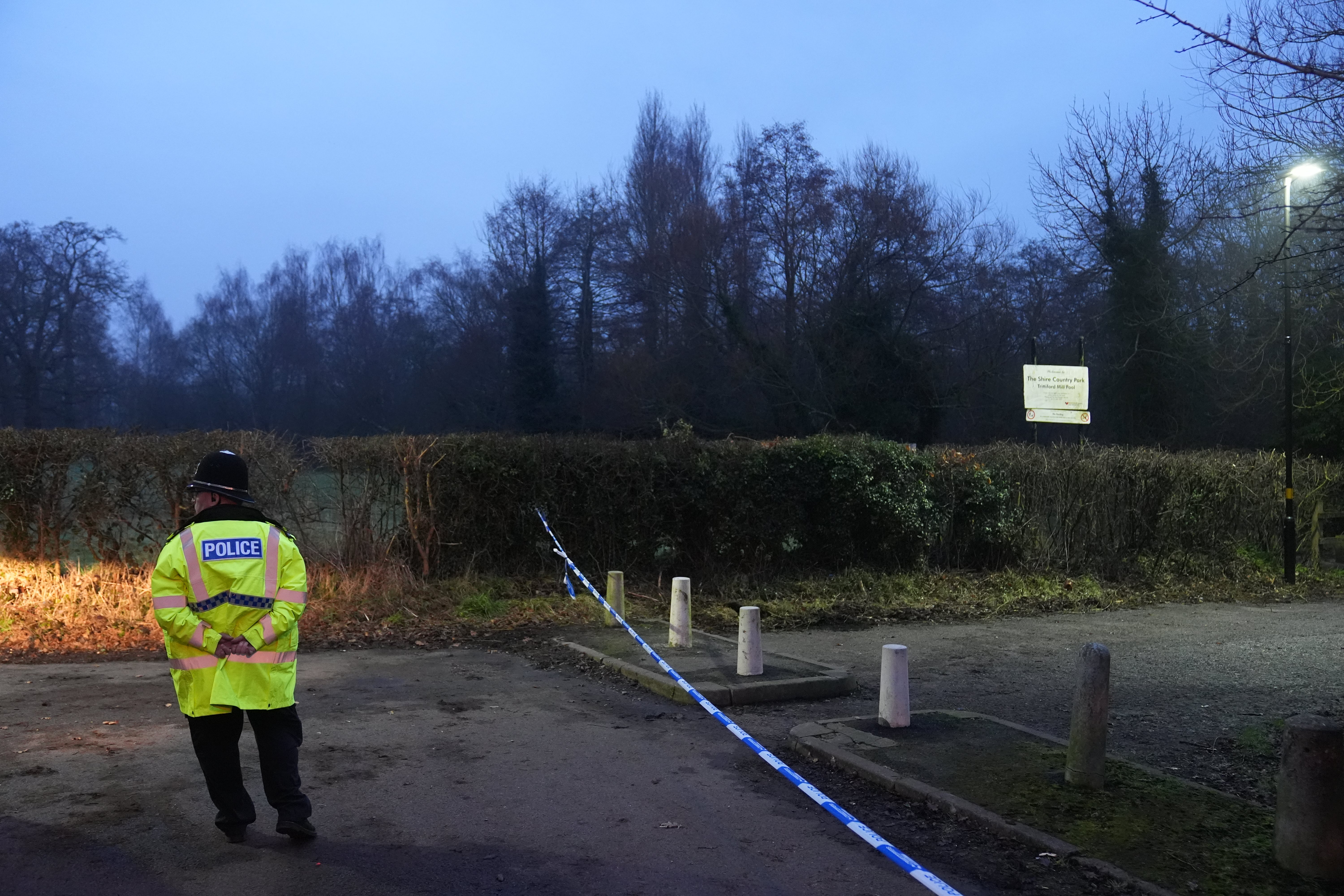 A police officer on stage near Scrulrirers Lane in the Hall Green area of ​​Birmingham