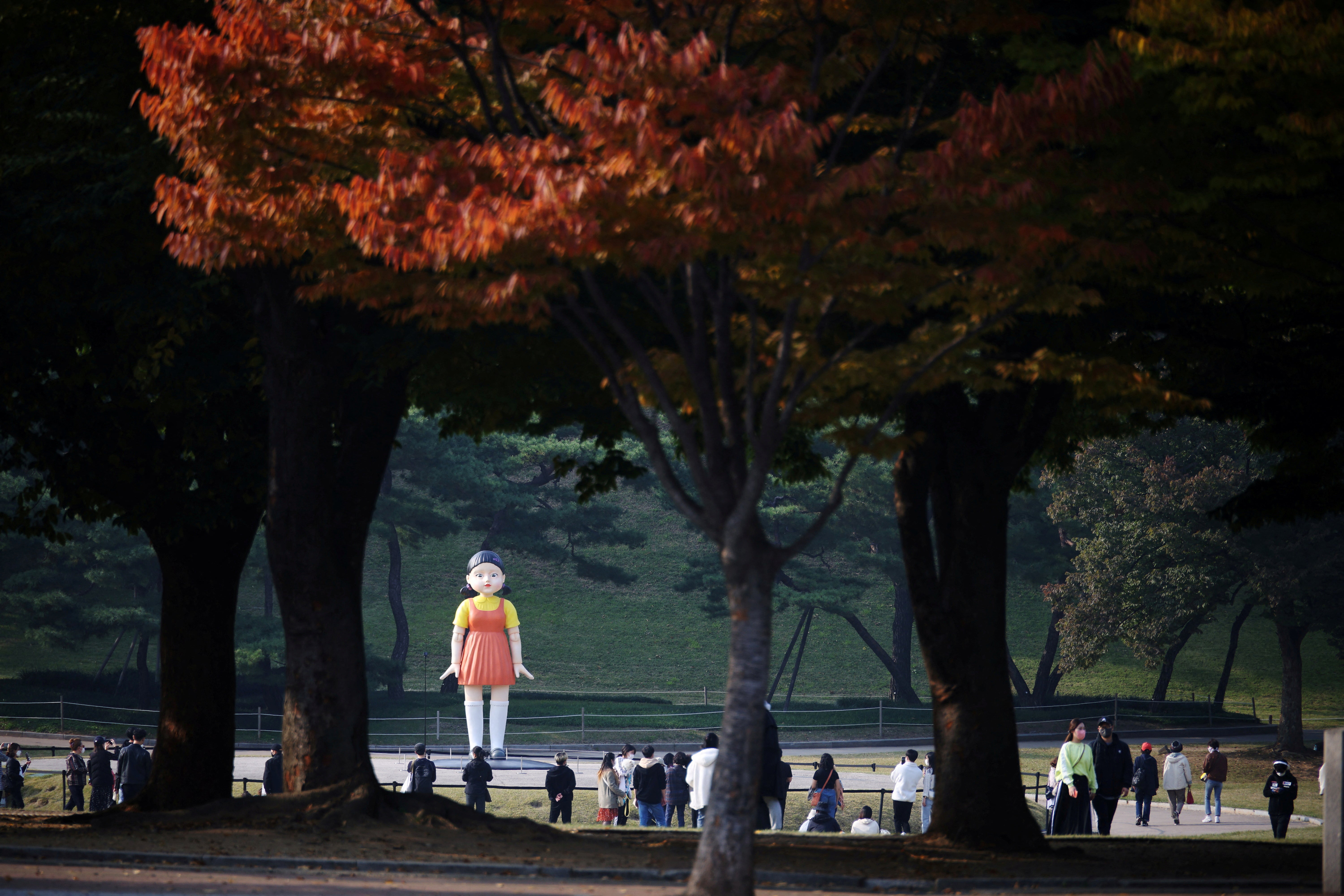 A giant doll named 'Younghee' from Netflix series 'Squid Game' is on display at a park in Seoul, South Korea, October 26, 2021