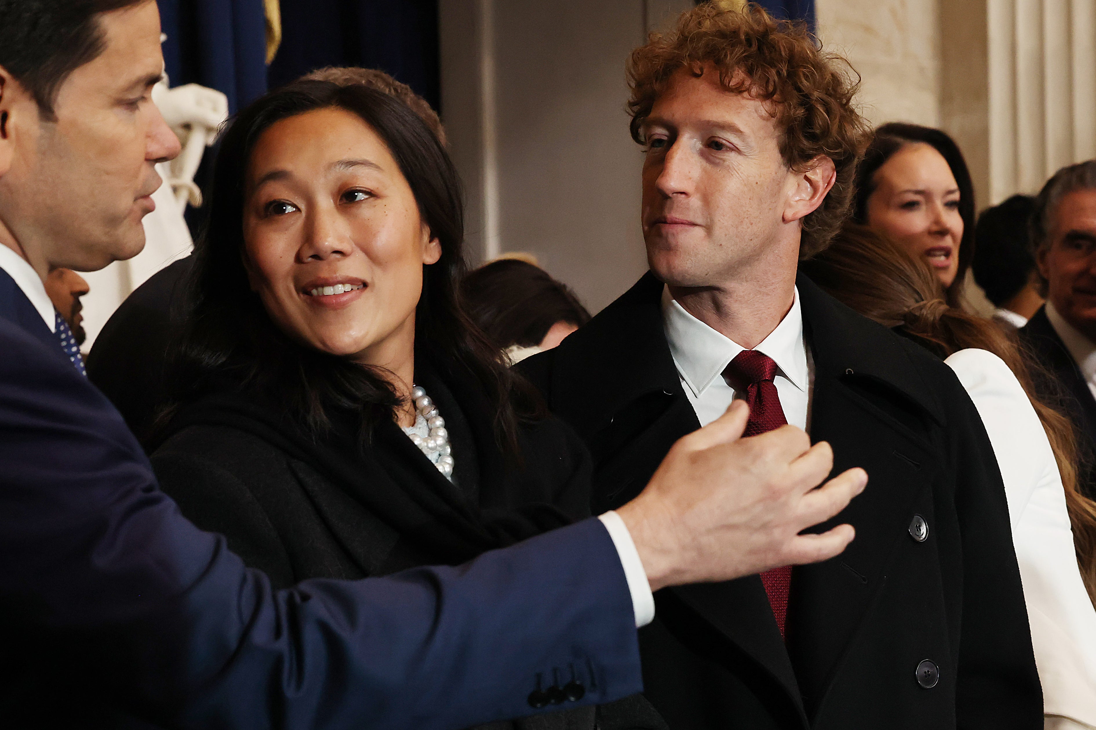 Mark Zuckerberg and his wife Priscilla Chan speak with Marco Rubio at the US Capitol