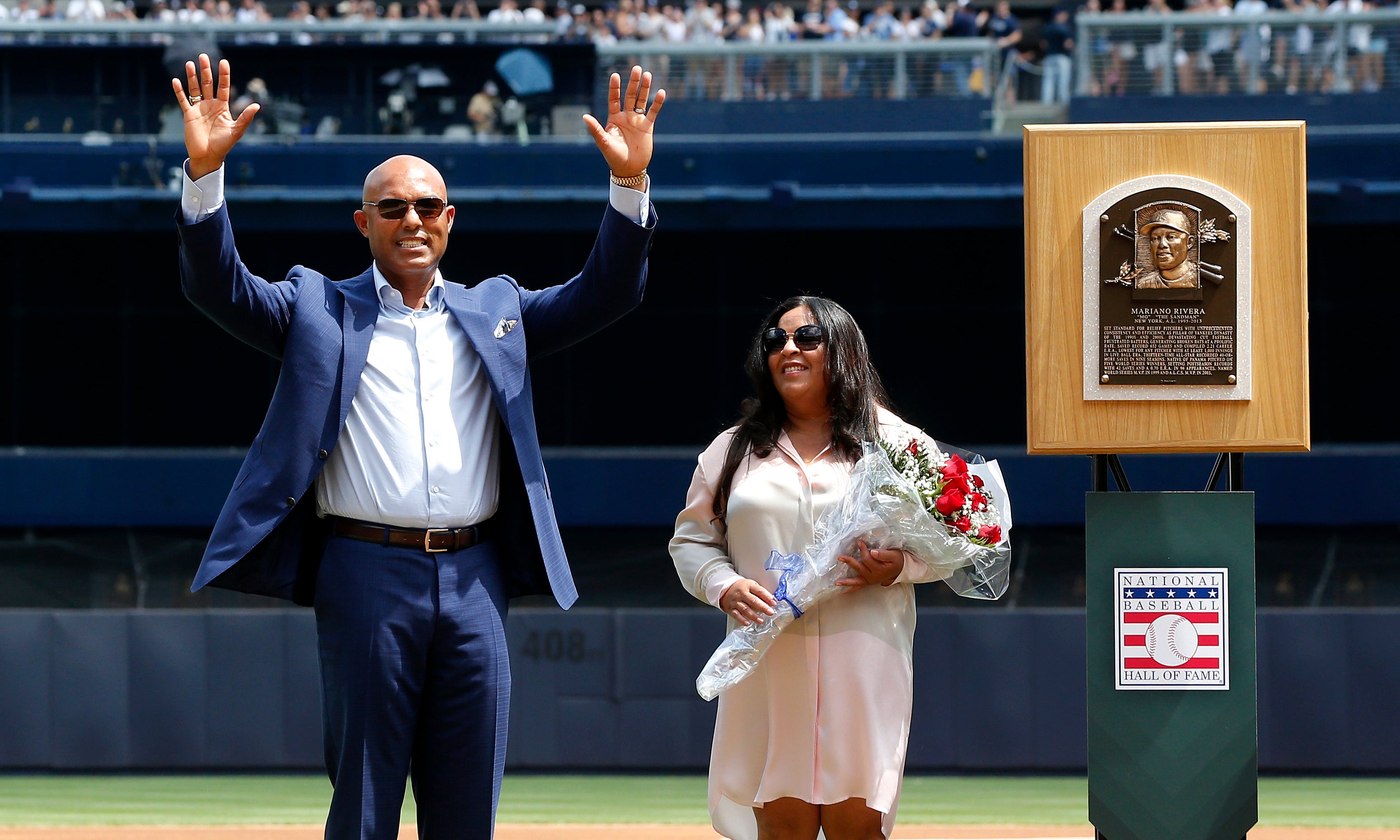 Mariano Rivera pictured with his wife, Clara, at a celebration of his legacy at Yankee Stadium in 2019