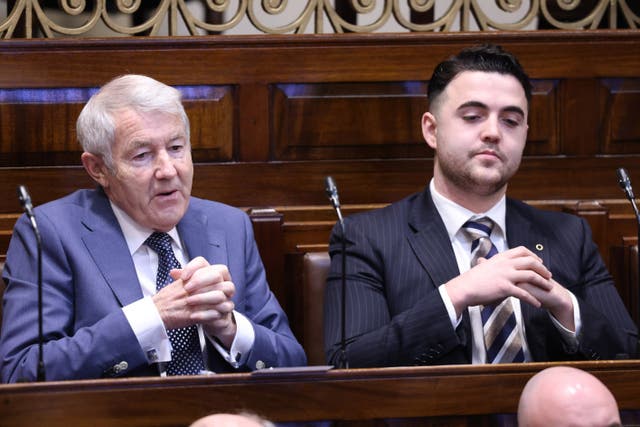 Independent TDs Michael Lowry and Barry Heneghan in the Dail chamber ahead of the vote on the nomination of Micheal Martin as Taoiseach (Handout/PA)