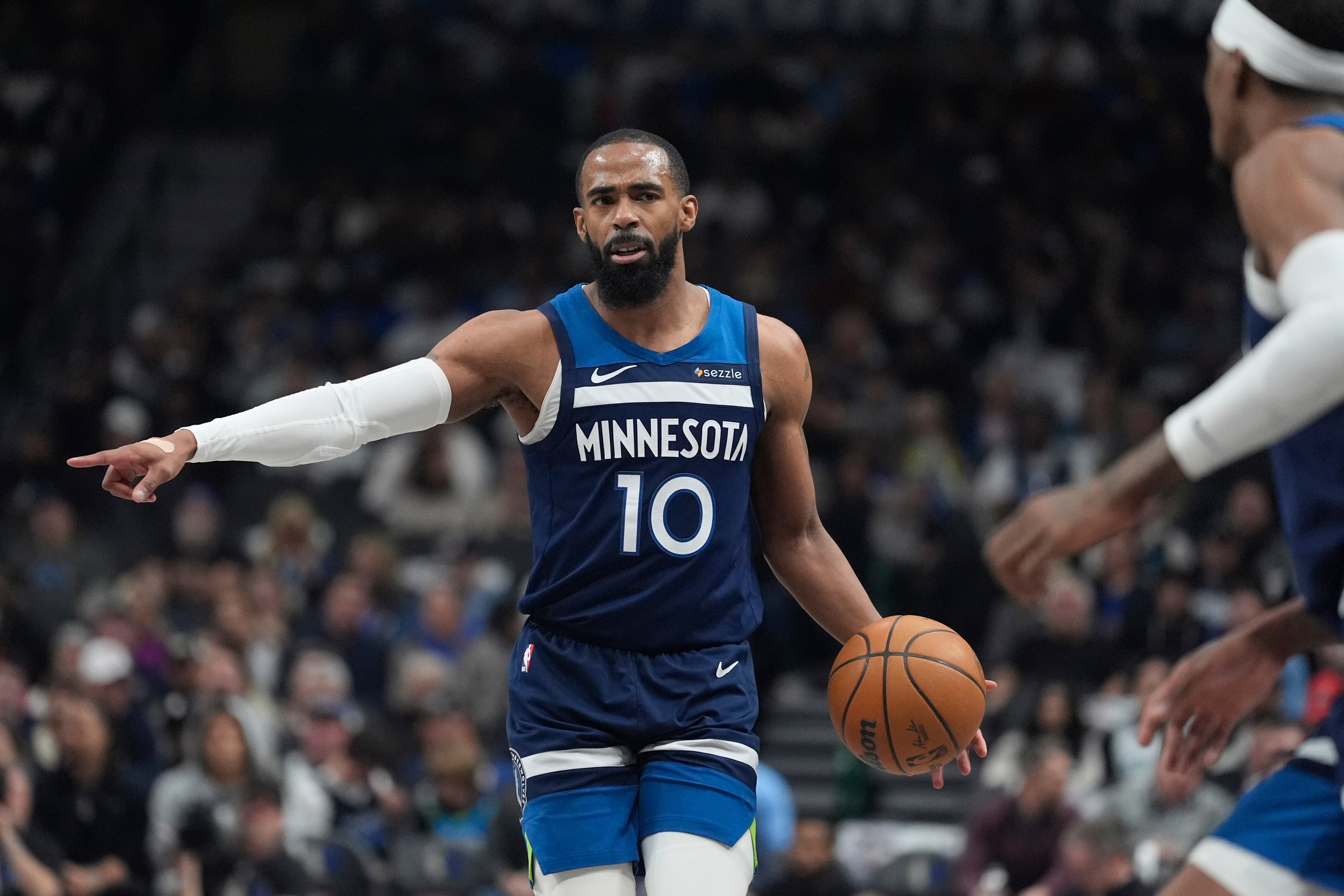Mike Conley photographed playing for the Minnesota Timberwolves on Janaury 22, 2025