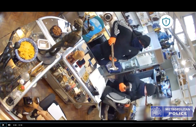 <p>Footage of James Dixon, 42, and Thomas Loring, 41, as they robbed an antique jewellery shop owned by Ian Towning</p>