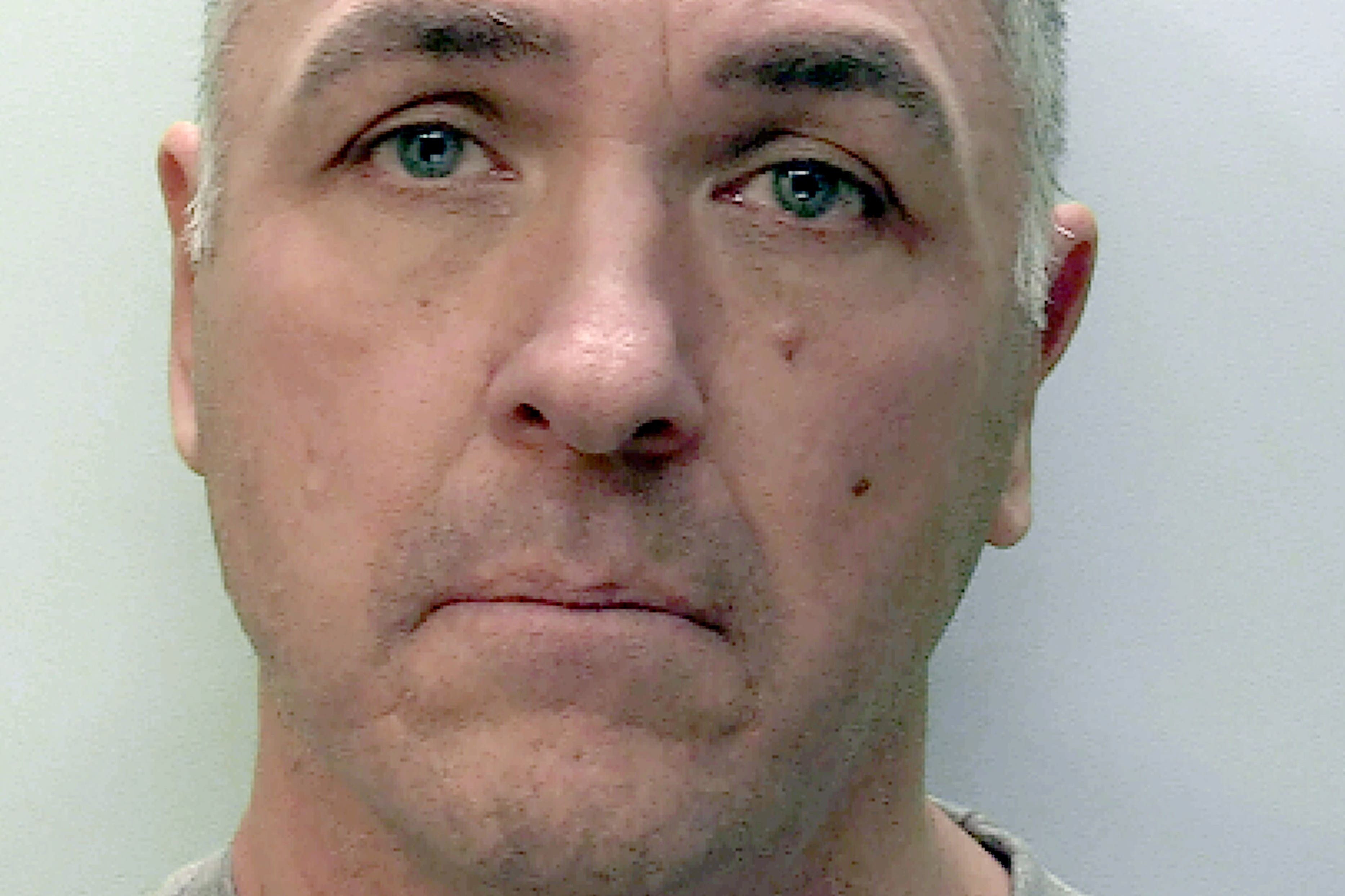 Paul Antony Butler, 53, is wanted in connection with the death of a woman who was found injured in the street in Plymouth (Devon & Cornwall Police/PA)